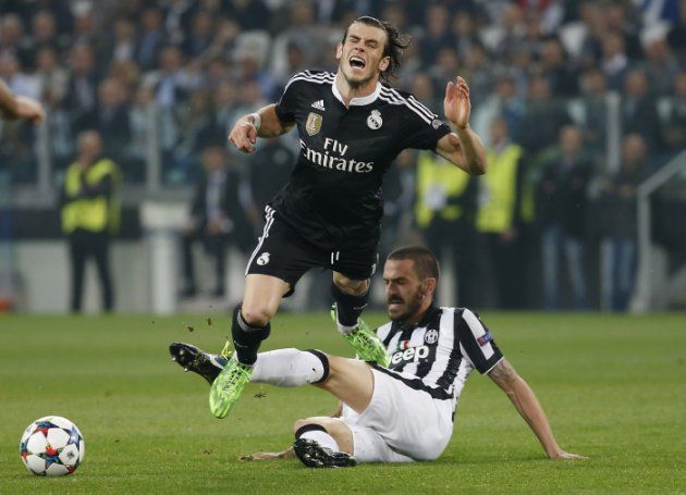 Football - Juventus v Real Madrid - UEFA Champions League Semi Final First Leg - Juventus Stadium, Turin, Italy - 5/5/15
Juventus's Leonardo Bonucci in action with Real Madrid's Gareth Bale
Reuters / Sergio Perez
 - RTX1BP27