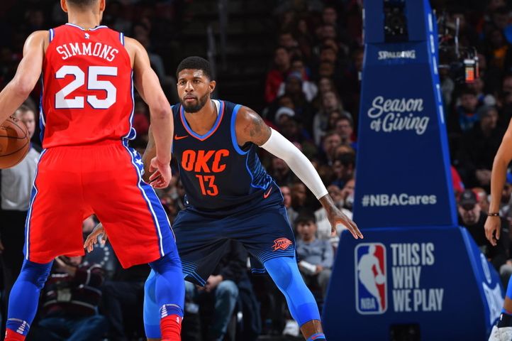 PHILADELPHIA,PA -  DECEMBER 15 : Paul George #13 of the Oklahoma City Thunder plays tight defense against the Philadelphia 76ers at Wells Fargo Center on December 15, 2017 in Philadelphia, Pennsylvania NOTE TO USER: User expressly acknowledges and agrees that, by downloading and/or using this Photograph, user is consenting to the terms and conditions of the Getty Images License Agreement. Mandatory Copyright Notice: Copyright 2017 NBAE (Photo by Jesse D. Garrabrant/NBAE via Getty Images)