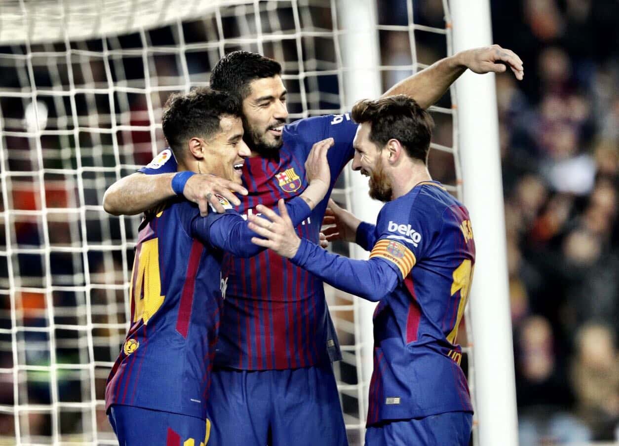 Abrazo entre los goleadores de la noche.