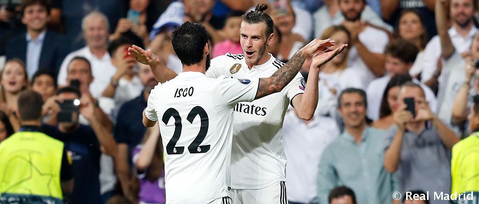Isco celebra un gol de Gareth Bale con el galés en un partido con el Real Madrid. Foto: Real Madrid Club de Fútbol.