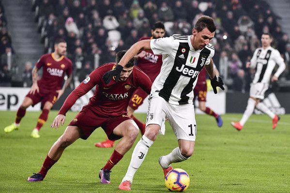 Mandzukic,el hombre del partido, y Manolas - Foto destacada vía: www.laroma24.it