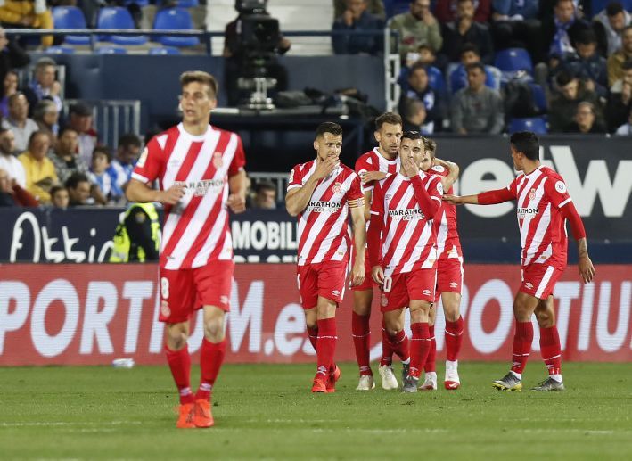 Portu celebra con sus compañeros uno de los goles