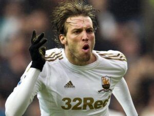 Michu celebra un gol en su etapa en el Swansea City