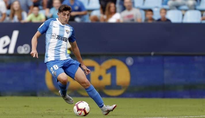 Álex Mula con la camiseta del Málaga la pasada campaña
