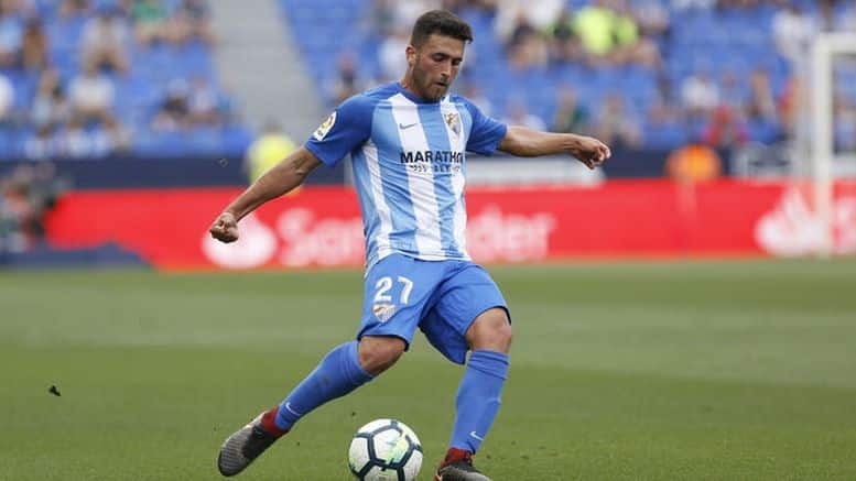 Álex Robles en un partido con el primer equipo del Málaga