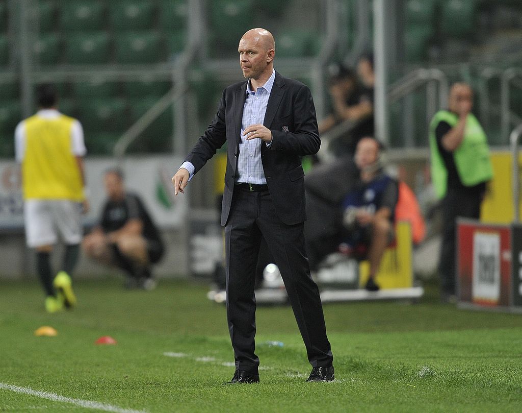 WARSAW, POLAND Ð JULY 30: Henning Berg head coach of Legia reacts during the third qualifying round UEFA Champions League match between Legia and Celtic at Pepsi Arena on July 30, 2014 in Warsaw, Poland. (Photo by Piotr Hawalej/Getty Images)