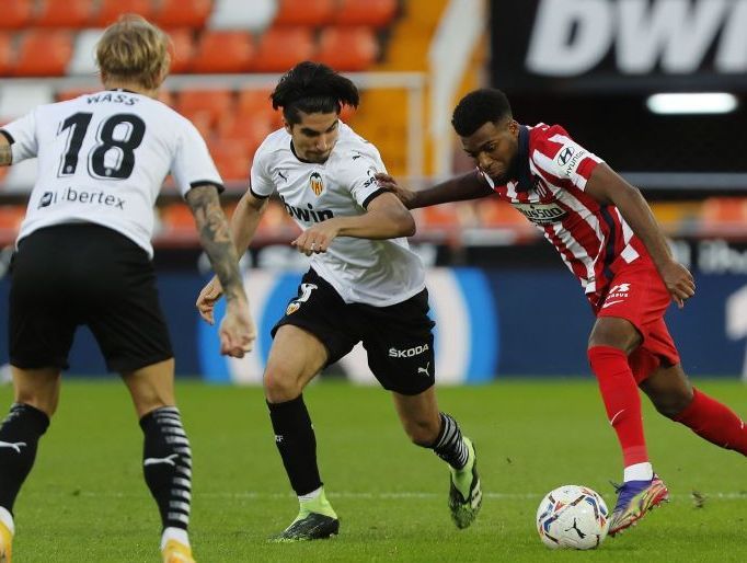 Carlos Soler con Thomas Lemas