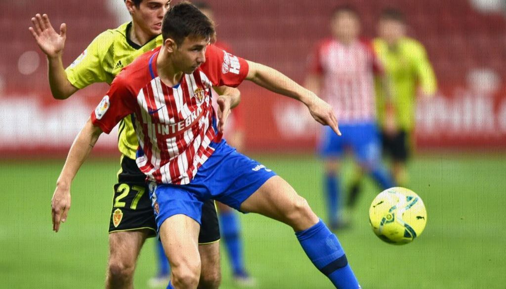 Saúl García con Francho en un Sporting-Zaragoza