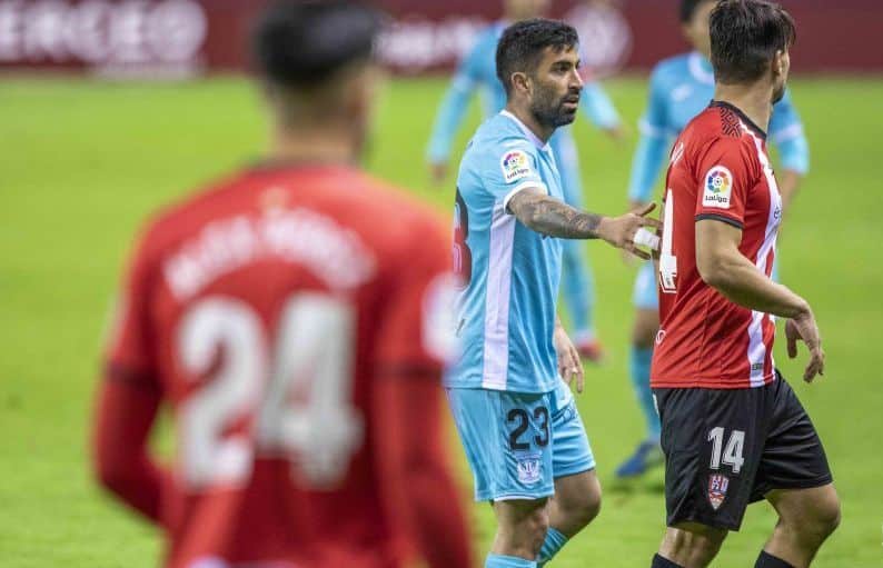 Michael Santos con Ion Errasti en un Logroñés-Leganés