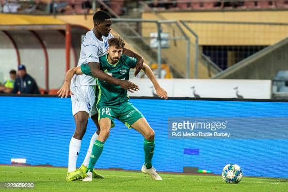 LAUSANNE, SWITZERLAND - JUNE 30: #10 Juan Manuel Parapar of FC Stade Lausanne Ouchy battles for the ball with #6 Elton Monteiro of FC Lausanne-Sport during the Challenge League game between FC Lausanne-Sport and FC Stade Lausanne Ouchy at Stade Olympique de la Pontaise on June 30, 2020 in Lausanne, Switzerland. (Photo by RvS.Media/Basile Barbey/Getty Images)