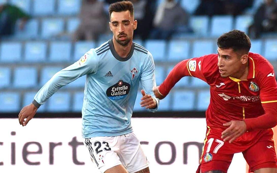 Brais Méndez y Mathias Olivera en un partido entre el Celta y el Getafe