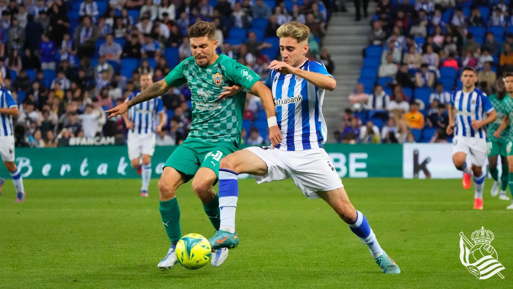 Pozo (Almería) y Robert Navarro (Real B) en un partido