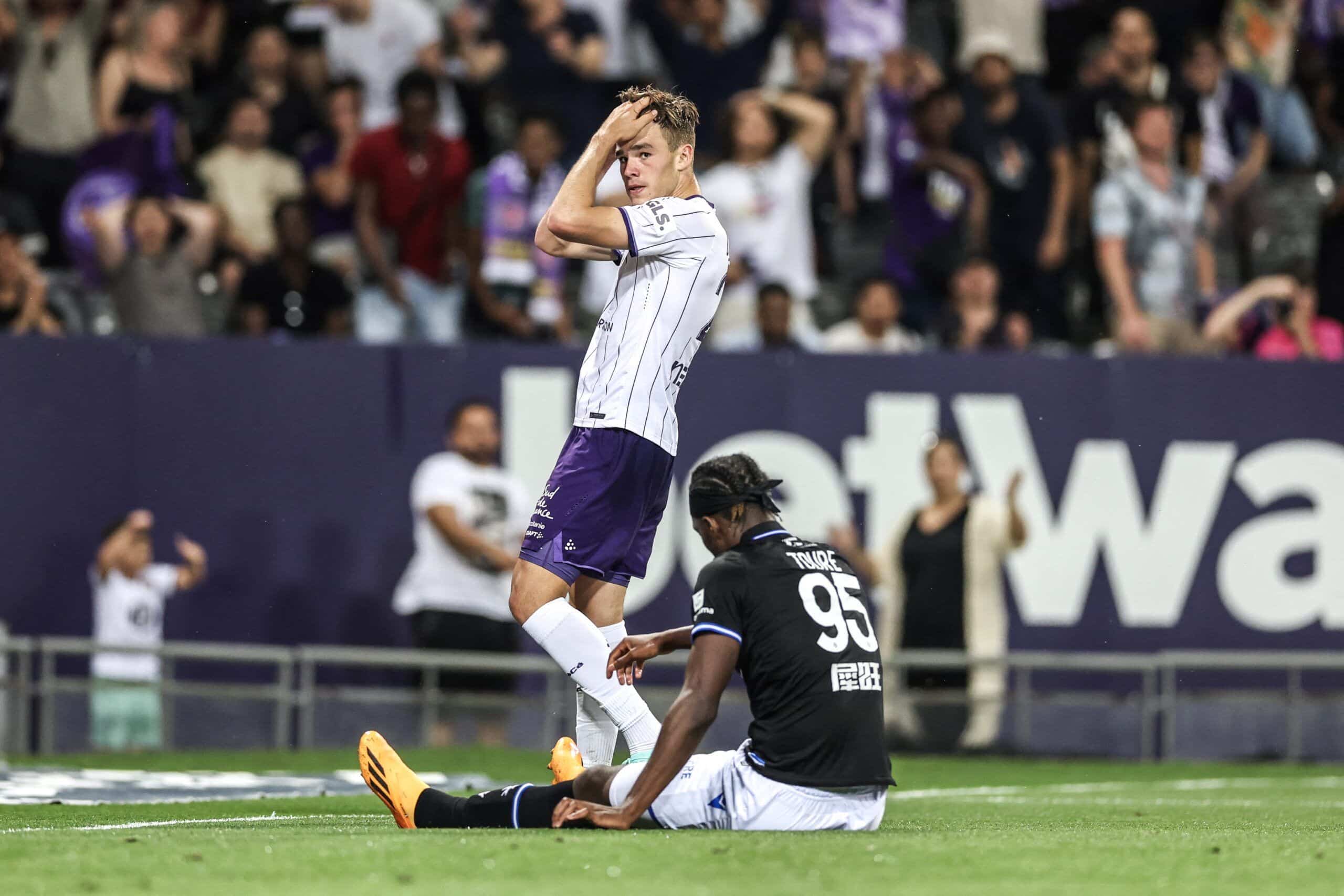 Toulouse's Dutch forward Thijs Dallinga (L) reacts during the French L1 football match between Toulouse FC and AJ Auxerre at The TFC Stadium in Toulouse, southwestern France, on May 27, 2023. (Photo by Charly TRIBALLEAU / AFP) (Photo by CHARLY TRIBALLEAU/AFP via Getty Images)