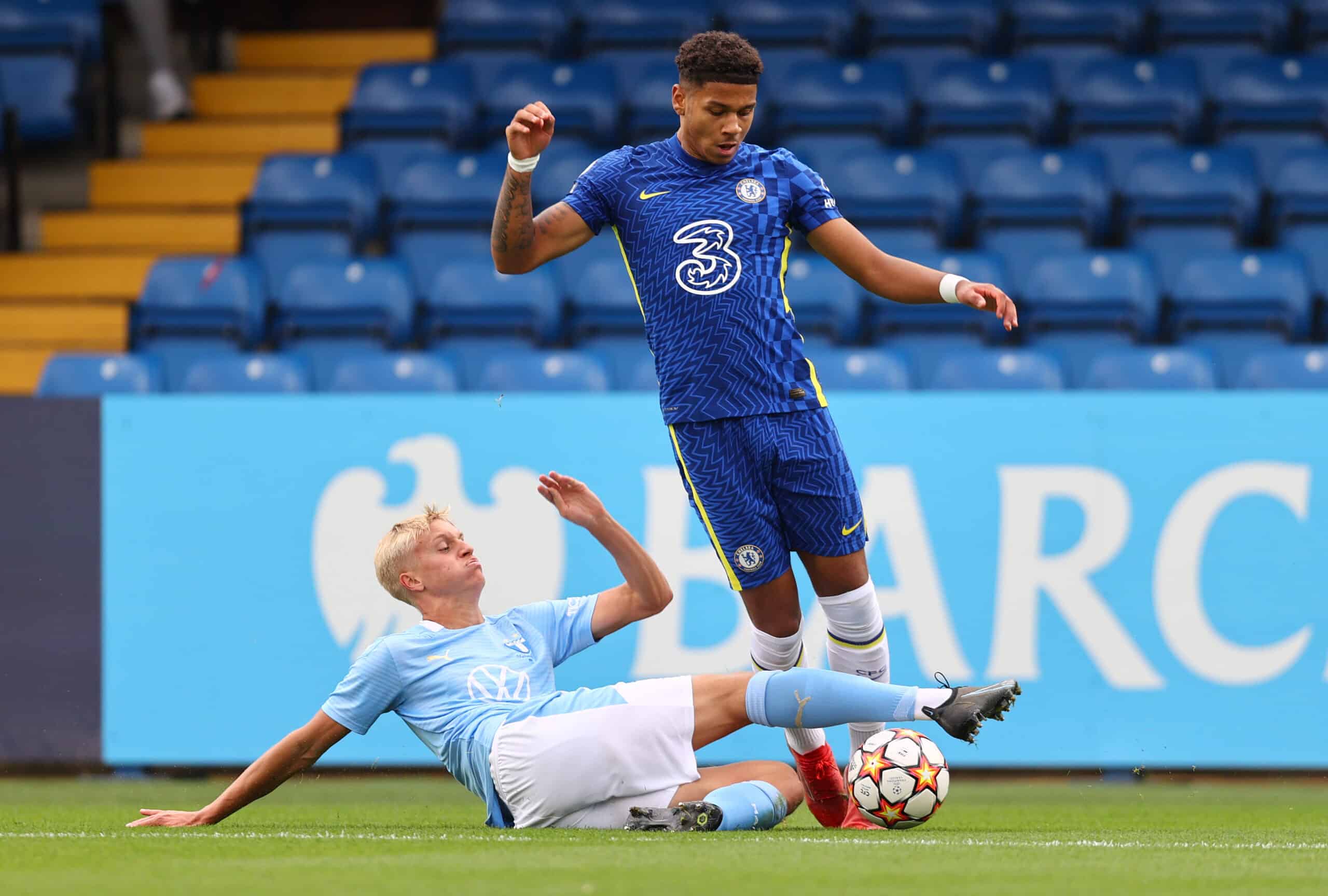 KINGSTON UPON THAMES, ENGLAND - OCTOBER 20: Bryan Fiabema of Chelsea battles for possession with Ludvig Nicklasson of Malmo FF during the UEFA Youth League match between FC Chelsea v Malmo FF at Kingsmeadow on October 20, 2021 in Kingston upon Thames, England. (Photo by Clive Rose/Getty Images)