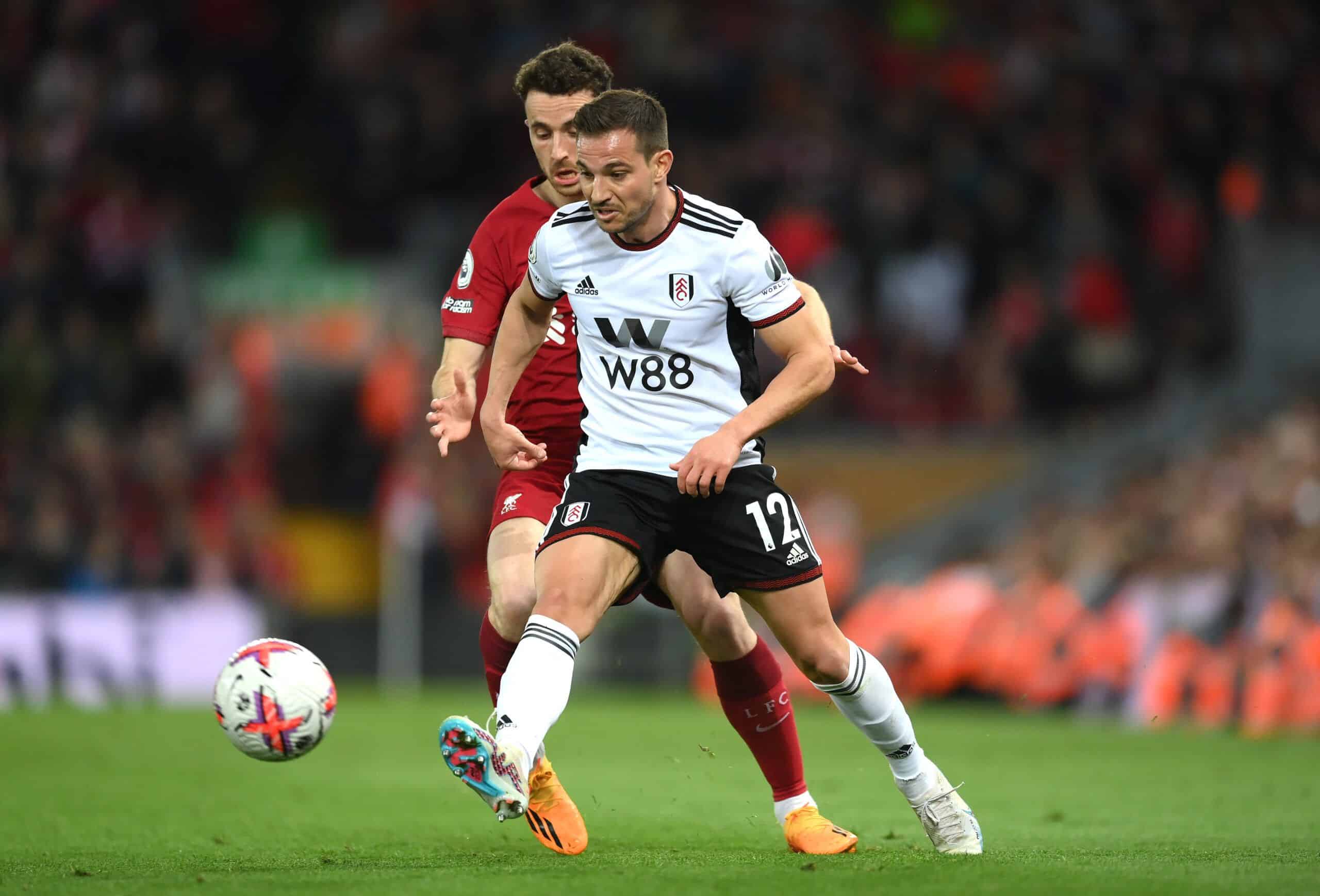 LIVERPOOL, ENGLAND - MAY 03:  Cedric Soares of Fulham passes the ball during the Premier League match between Liverpool FC and Fulham FC at Anfield on May 03, 2023 in Liverpool, England. (Photo by Shaun Botterill/Getty Images)