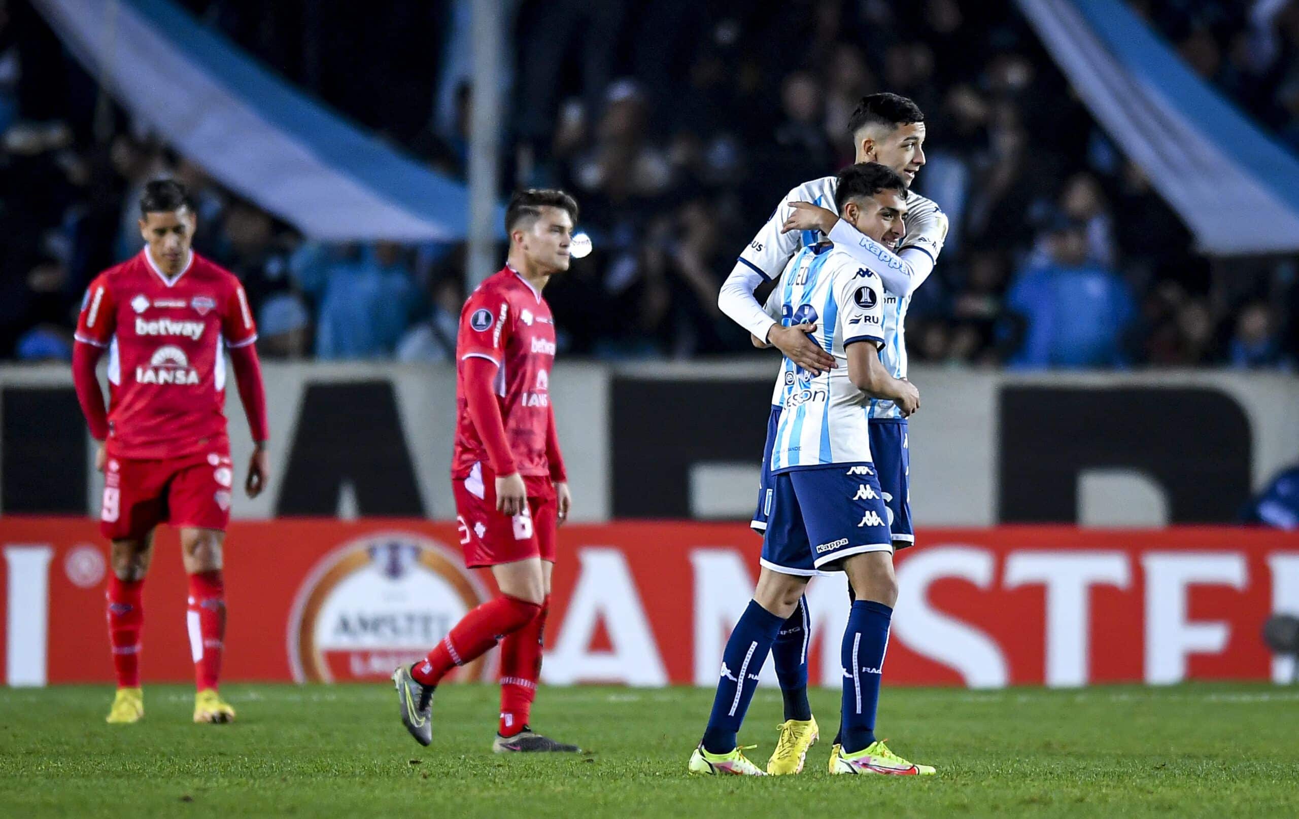 AVELLANEDA, ARGENTINA - JUNE 28: Tomás Avilés and Agustin Ojeda of Racing Club celebrate after winning a Copa CONMEBOL Libertadores 2023 Group A match between Racing Club and Ñublense at Presidente Peron Stadium on June 28, 2023 in Avellaneda, Argentina. (Photo by Marcelo Endelli / Getty Images)