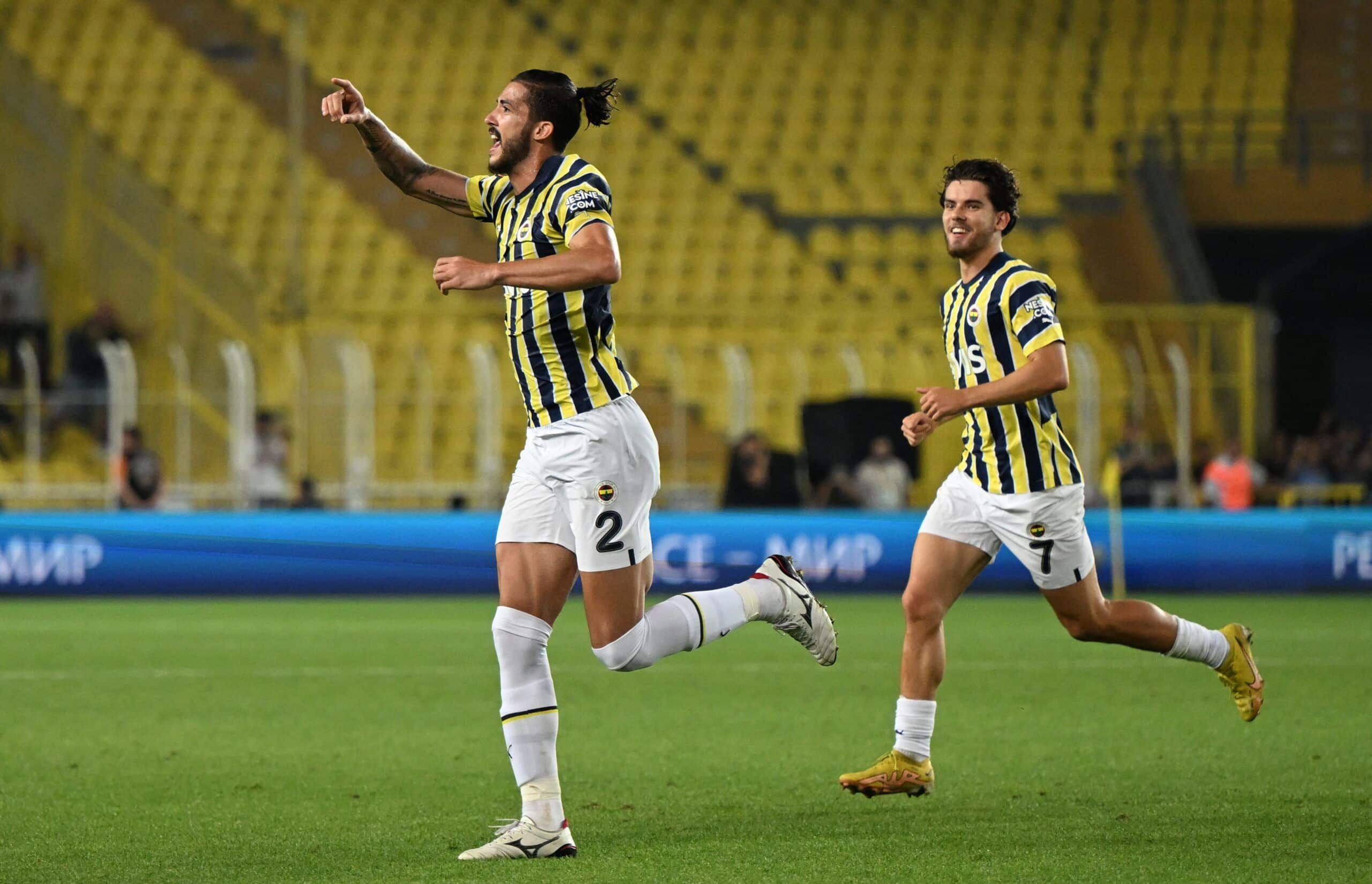 Fenerbahce's Bazilian defender Gustavo Henrique (L) celebrates with teammate Fenerbahce's Turkish midfielder Ferdi Kadioglu (R) after scoring the 1-0 goal during the UEFA Europa League group B football match between Fenerbahce SK and Dynamo Kyiv at the Fenerbahce Sukru Saracoglu stadium, in Istanbul on September 8, 2022. (Photo by Ozan KOSE / AFP) (Photo by OZAN KOSE/AFP via Getty Images)