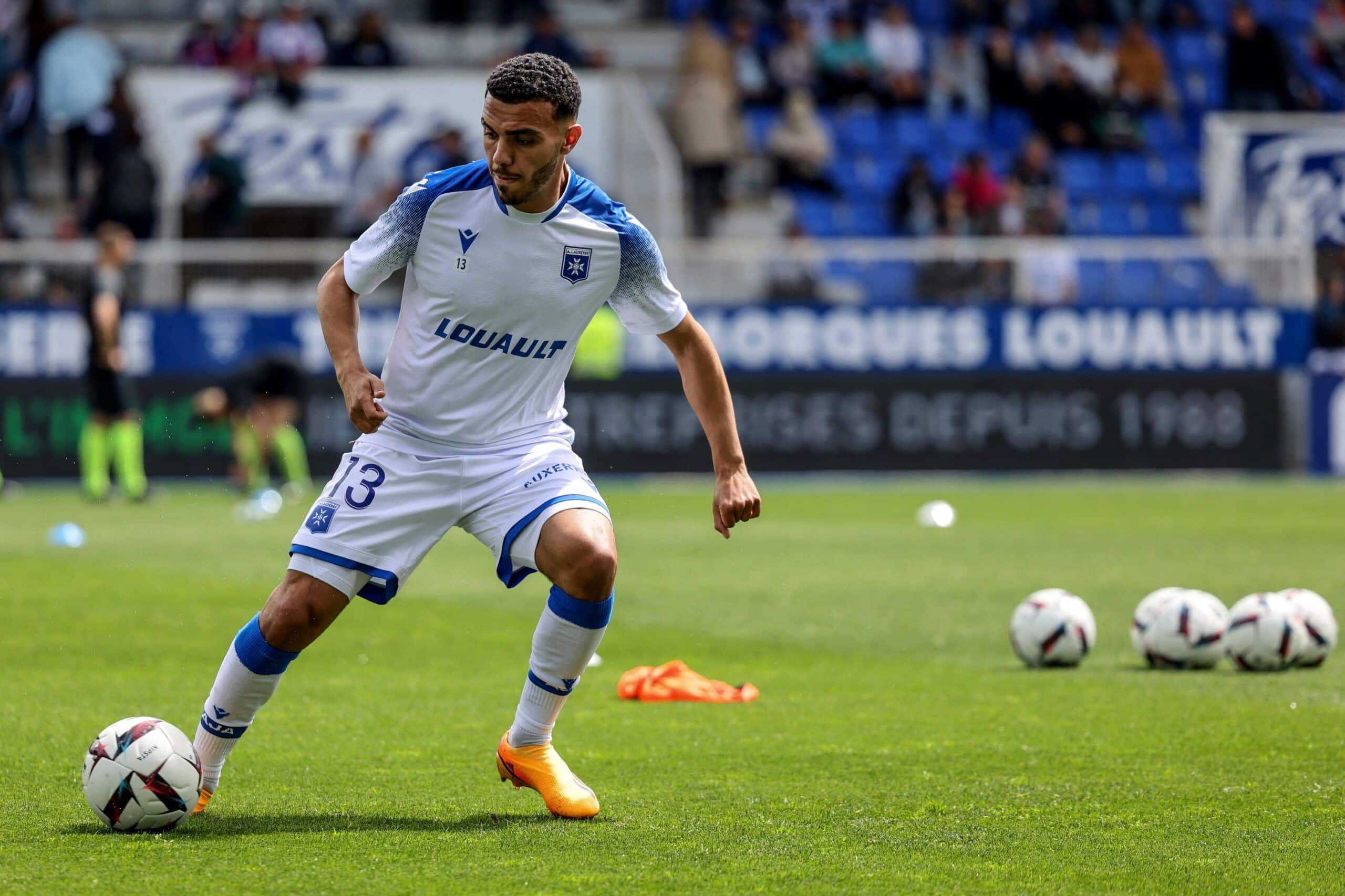 Auxerre's French defender Akim Zedadka warms up prior to the French L1 football match between AJ Auxerre and Clermont Foot 63 at Stade de l'Abbé-Deschamps in Auxerre, central France on May 7, 2023. (Photo by ARNAUD FINISTRE / AFP) (Photo by ARNAUD FINISTRE/AFP via Getty Images)