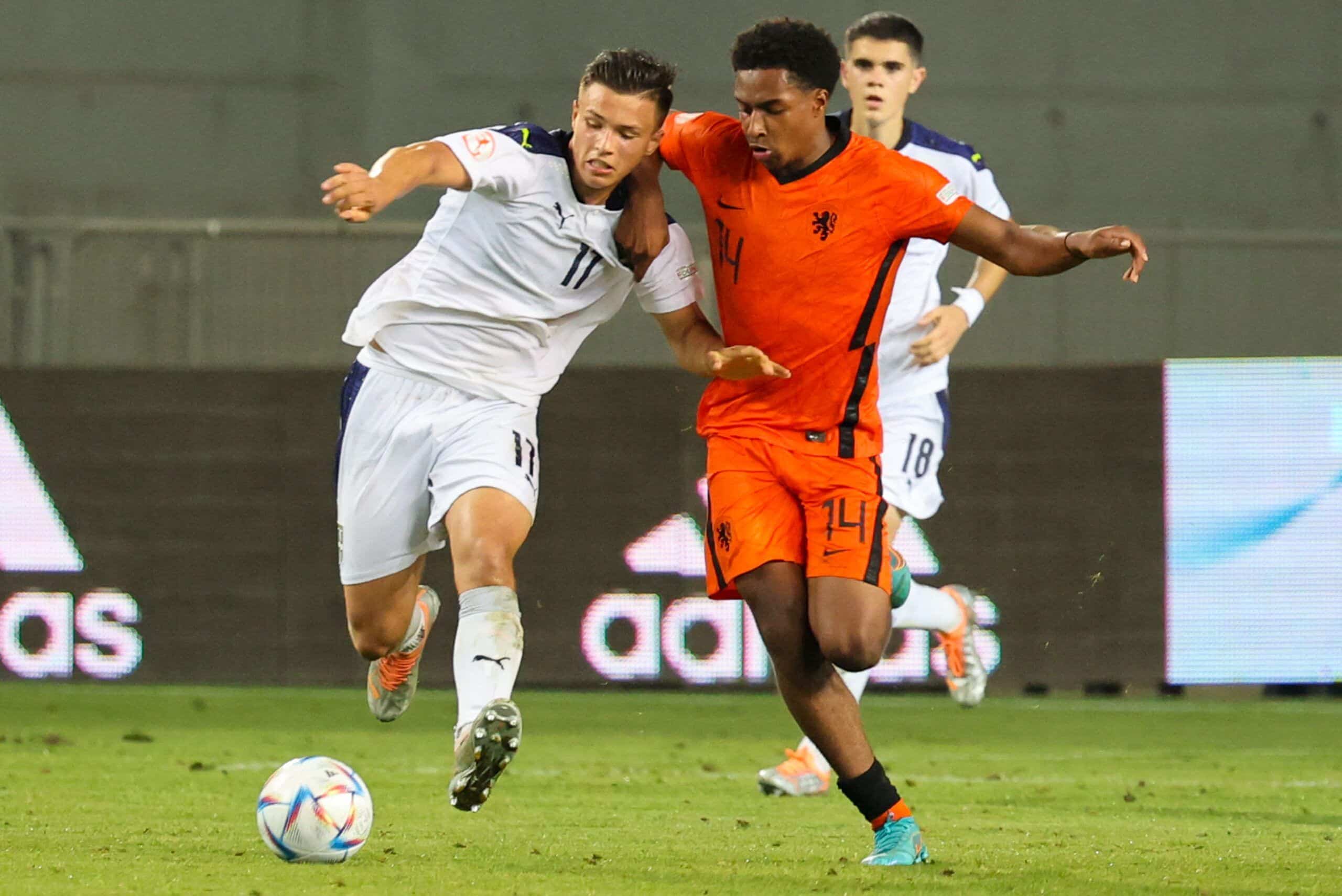 Netherland's midfielder Silvano Vos (R) vies for the ball with Serbia's forward Jovan Mijatovic during the 2022 UEFA European Under-17 Championship semi-final football match between Netherlands and Serbia at the Netanya stadium in the Israeli city on May 29, 2022. (Photo by JACK GUEZ / AFP) (Photo by JACK GUEZ/AFP via Getty Images)