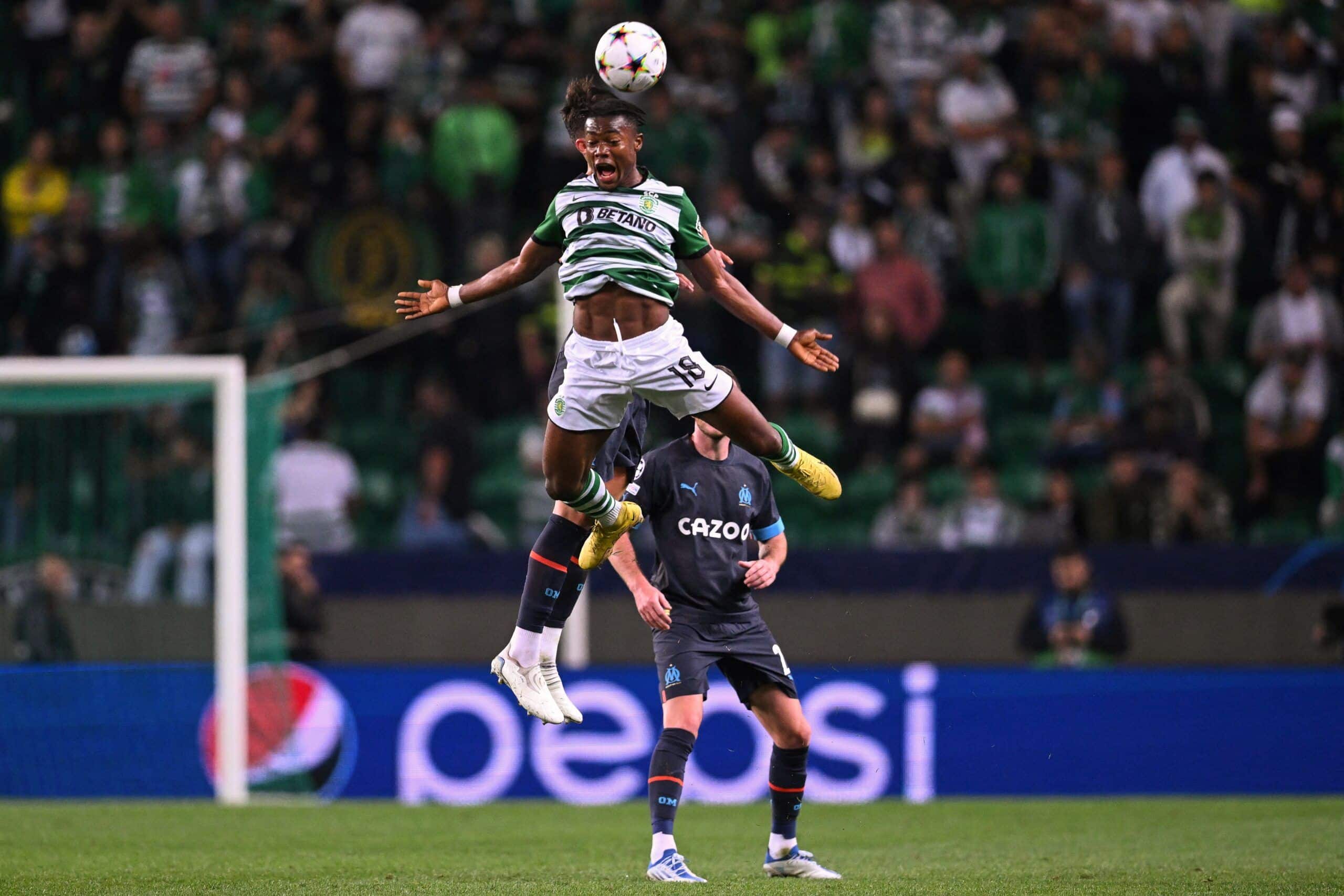 TOPSHOT - Sporting Lisbon's Ghanaian forward Abdul Fatawu Issahaku (Top) heads the ball during the UEFA Champions League 1st round, group D, football match between Sporting CP and Olympique de Marseille at the Jose Alvalade stadium in Lisbon on October 12, 2022. (Photo by PATRICIA DE MELO MOREIRA / AFP) (Photo by PATRICIA DE MELO MOREIRA/AFP via Getty Images)