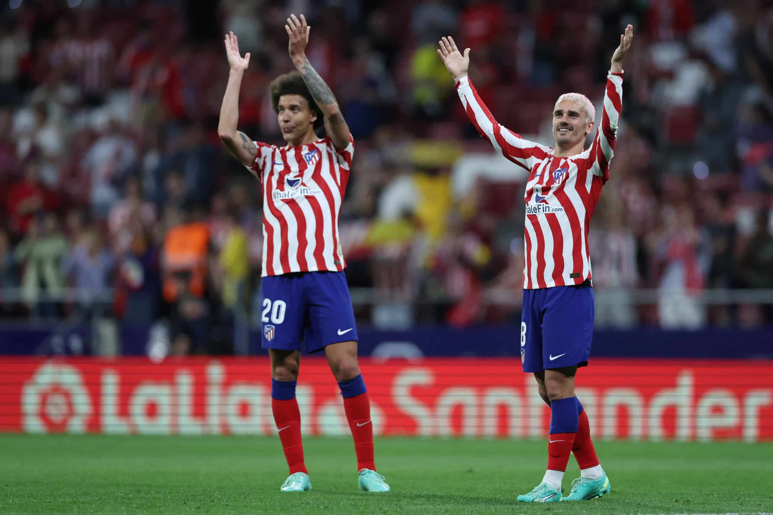 Atletico Madrid's French forward Antoine Griezmann (R) and Atletico Madrid's Belgian midfielder Axel Witsel celebrate their win at the end of the Spanish league football match between Club Atletico de Madrid and Cadiz CF at the Wanda Metropolitano stadium in Madrid on May 3, 2023. (Photo by Pierre-Philippe MARCOU / AFP) (Photo by PIERRE-PHILIPPE MARCOU/AFP via Getty Images)