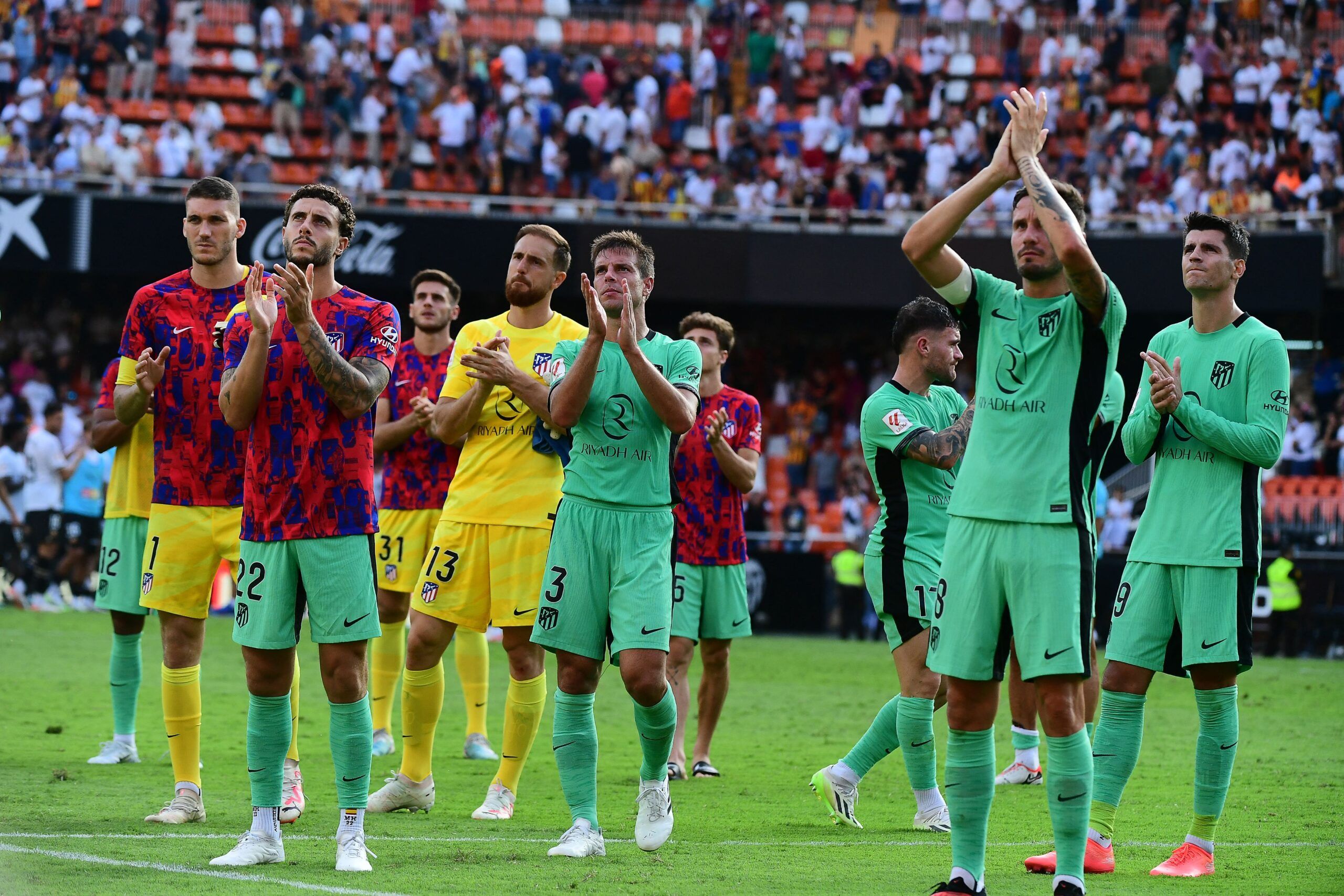Atletico Madrid's players react at the end of the Spanish Liga football match between Valencia CF and Club Atletico de Madrid at the Mestalla stadium in Valencia on September 16, 2023. (Photo by Jose Jordan / AFP) (Photo by JOSE JORDAN/AFP via Getty Images)