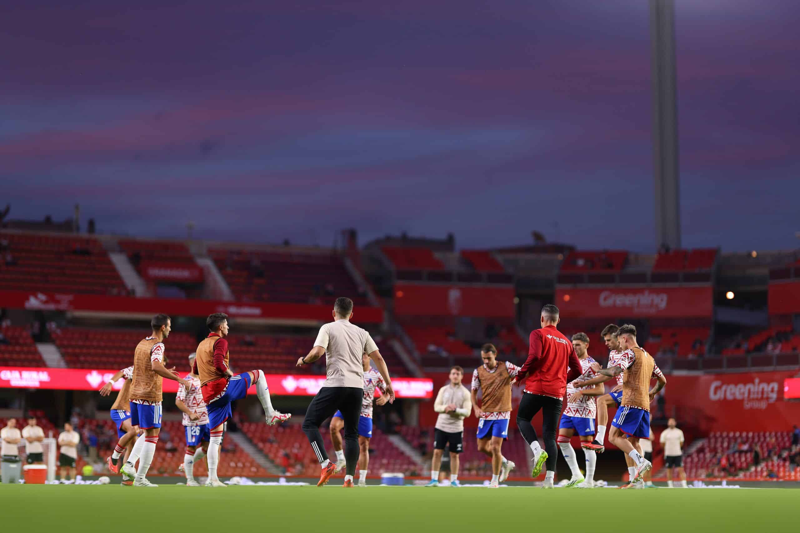 GRANADA, SPAIN - SEPTEMBER 18: General view inside the stadium as players of Granada CF warm up prior to the LaLiga EA Sports match between Granada CF and Girona FC at Estadio Nuevo Los Carmenes on September 18, 2023 in Granada, Spain. (Photo by Fran Santiago/Getty Images)