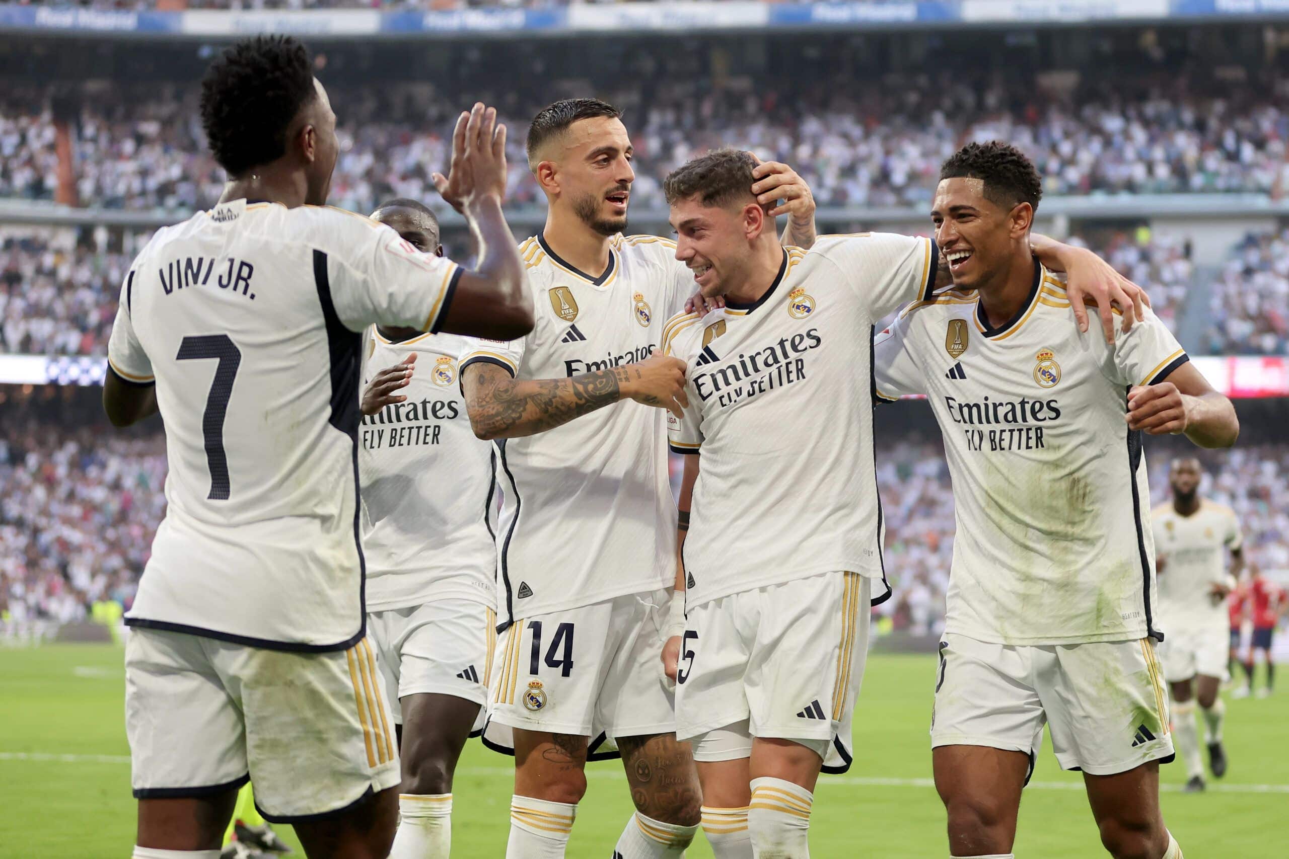 MADRID, SPAIN - OCTOBER 07: Vinicius Junior, Joselu, Federico Valverde and Jude Bellingham of Real Madrid celebrate during the LaLiga EA Sports match between Real Madrid CF and CA Osasuna at Estadio Santiago Bernabeu on October 07, 2023 in Madrid, Spain. (Photo by Florencia Tan Jun/Getty Images)