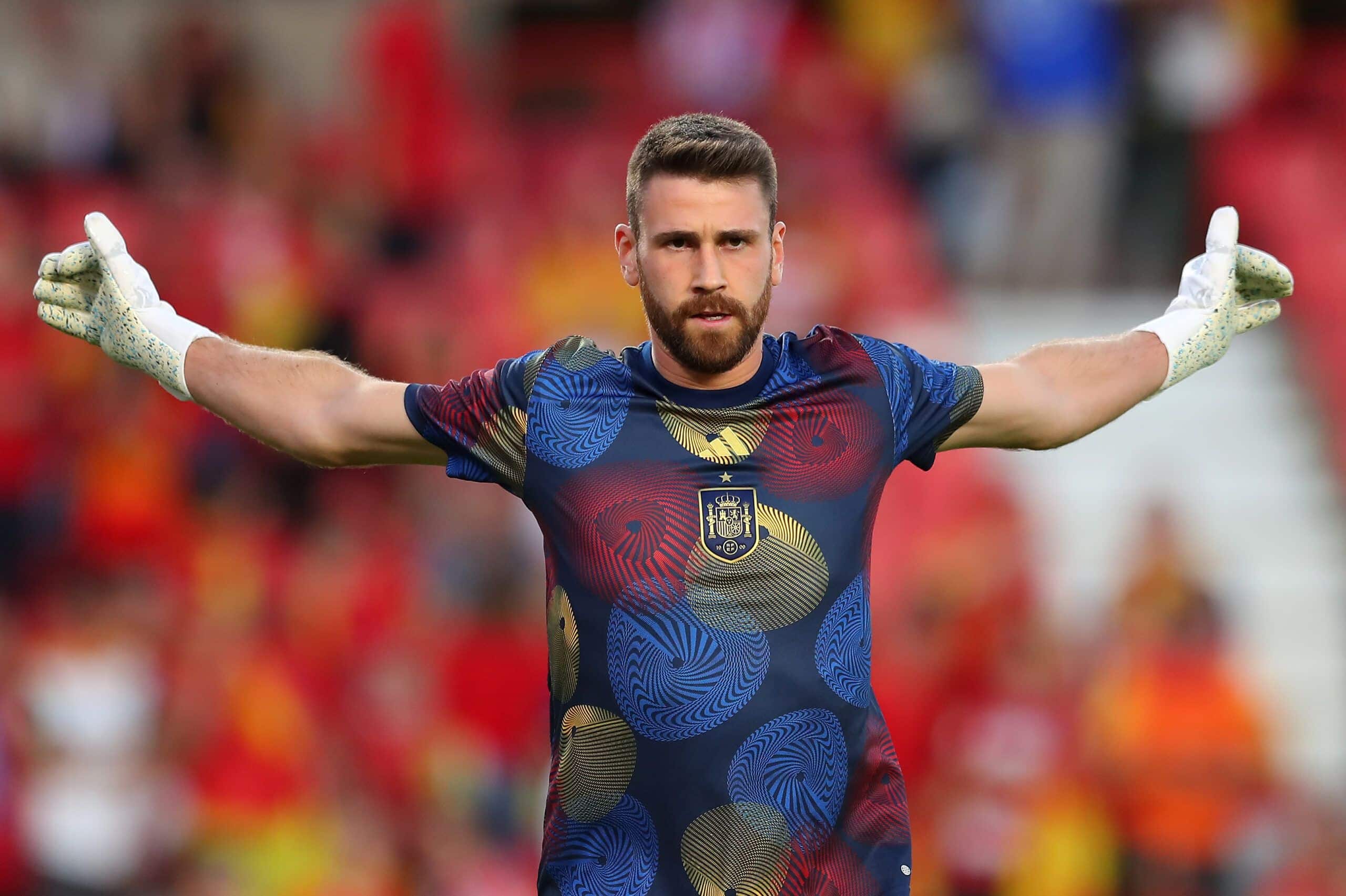 GRANADA, SPAIN - SEPTEMBER 12: Unai Simon of Spain warms up prior to the UEFA EURO 2024 European qualifier match between Spain and Cyprus at Estadio Nuevo Los Carmenes on September 12, 2023 in Granada, Spain. (Photo by Fran Santiago/Getty Images)