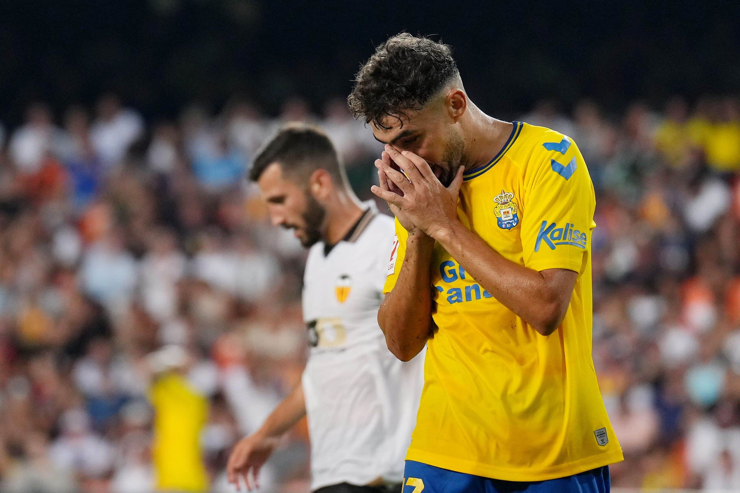 VALENCIA, SPAIN - AUGUST 18: Munir El Haddadi of Las Palmas reacts after a missed chance during the LaLiga EA Sports match between Valencia CF and UD Las Palmas at Estadio Mestalla on August 18, 2023 in Valencia, Spain. (Photo by Aitor Alcalde/Getty Images)