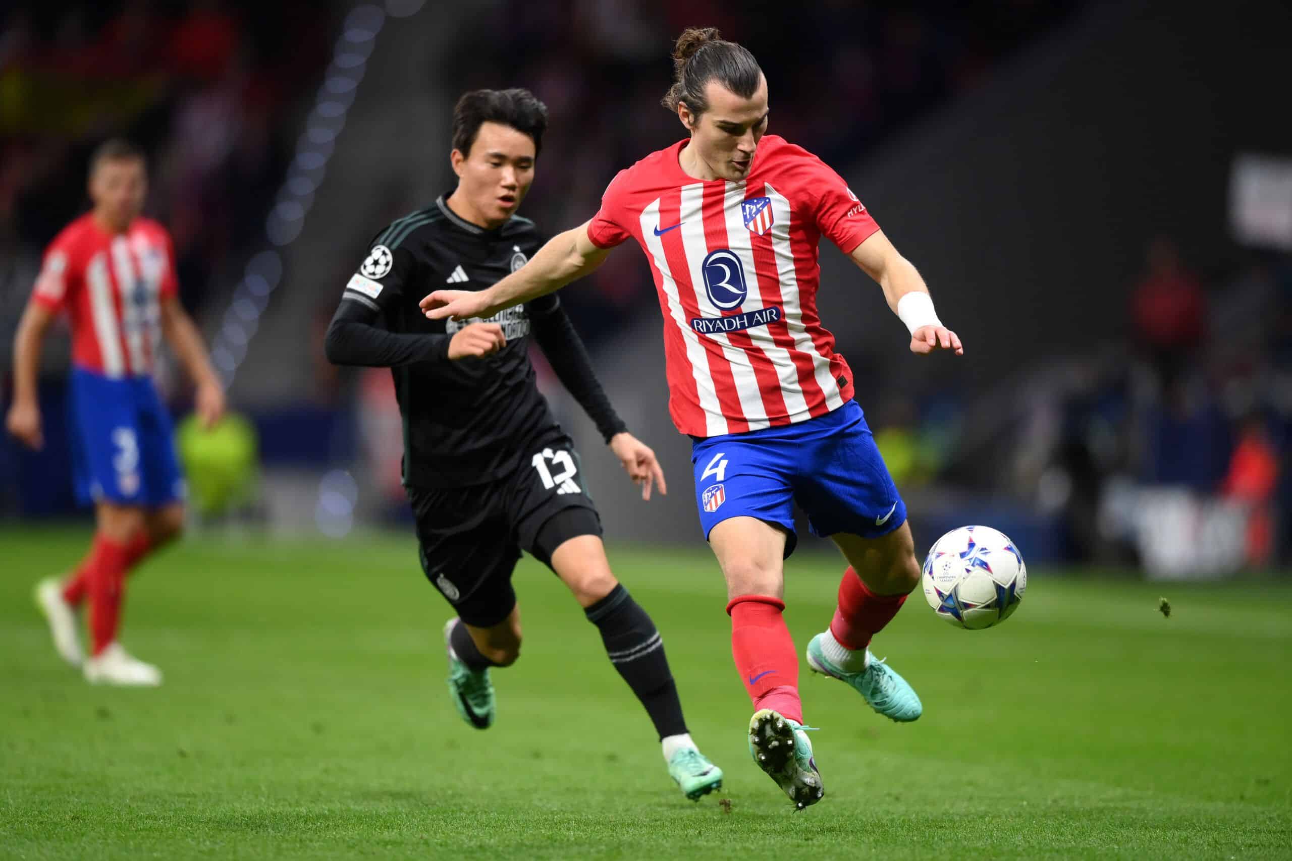 MADRID, SPAIN - NOVEMBER 07:  Caglar Soyuncu of Atletico Madrid takes on Yang Hyun-Jun of Celtic during the UEFA Champions League match between Atletico Madrid and Celtic FC at Civitas Metropolitano Stadium on November 07, 2023 in Madrid, Spain. (Photo by Justin Setterfield/Getty Images)
