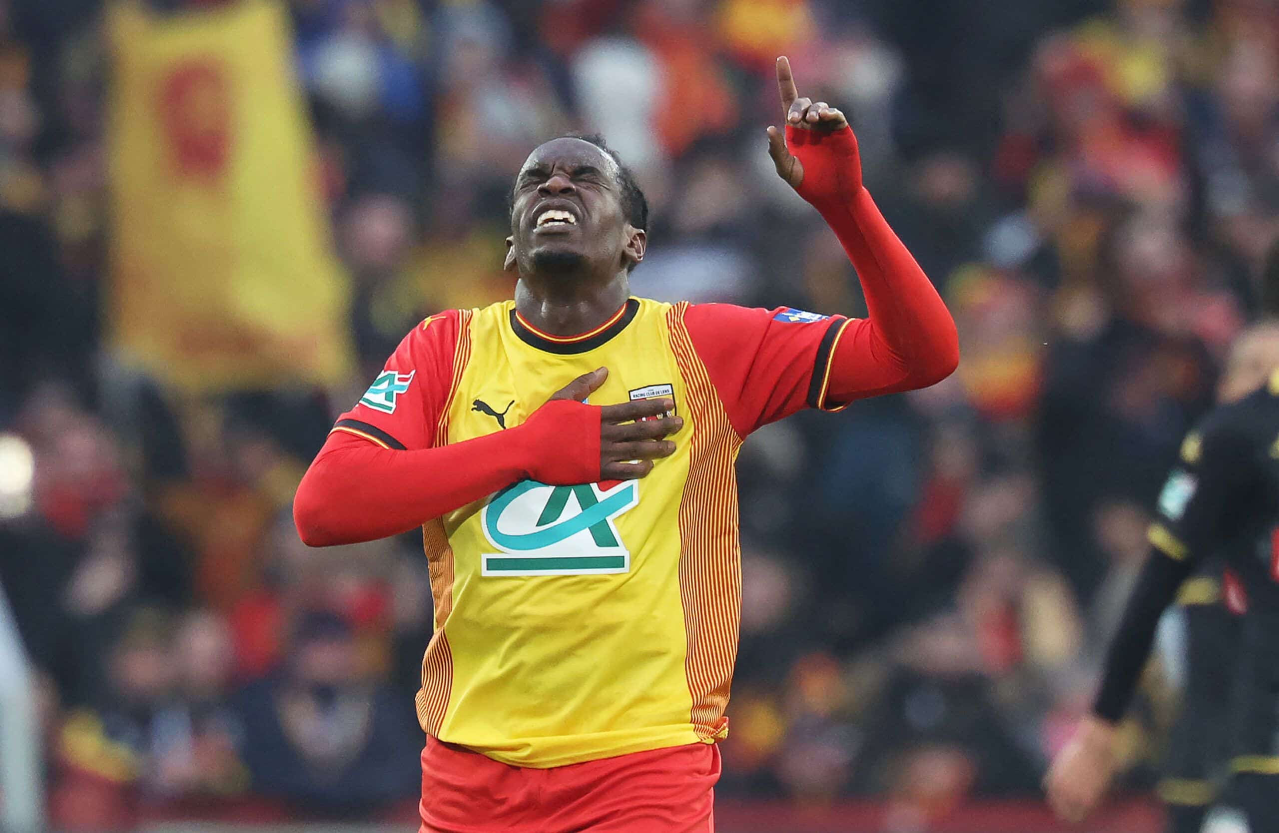 Lens' French midfielder Faitout Maouassa #11 celebrates after scoring a goal during the French Cup round of 64 football match between RC Lens and AS Monaco at the Stade Bollaert-Delelis in Lens, northern France, on January 7, 2024. (Photo by FRANCOIS LO PRESTI / AFP) (Photo by FRANCOIS LO PRESTI/AFP via Getty Images)