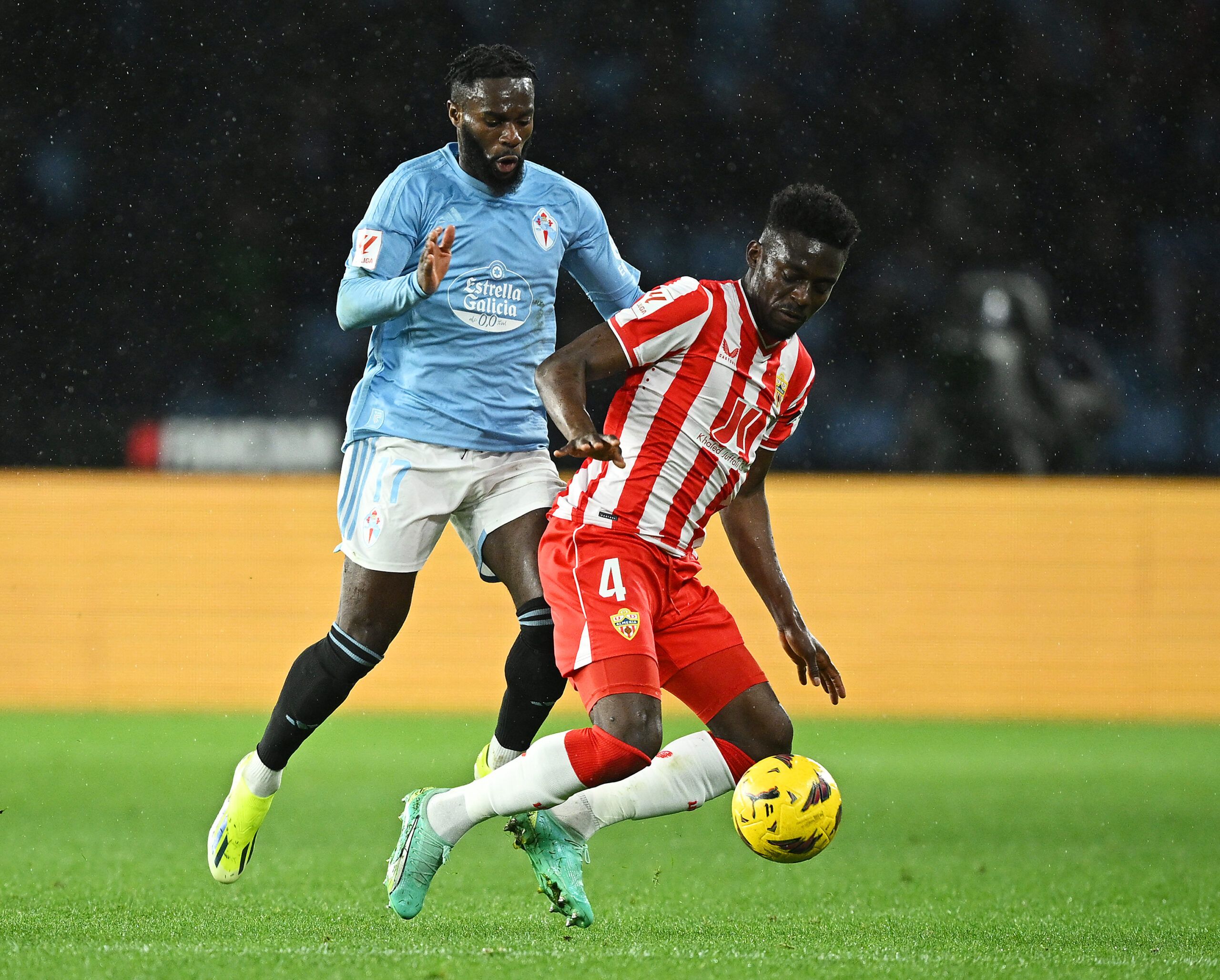 VIGO, SPAIN - MARCH 01: Jonathan Bamba of Celta Vigo challenges Iddrisu Baba of UD Almeria during the LaLiga EA Sports match between Celta Vigo and UD Almeria at Estadio Balaidos on March 01, 2024 in Vigo, Spain. (Photo by Octavio Passos/Getty Images)