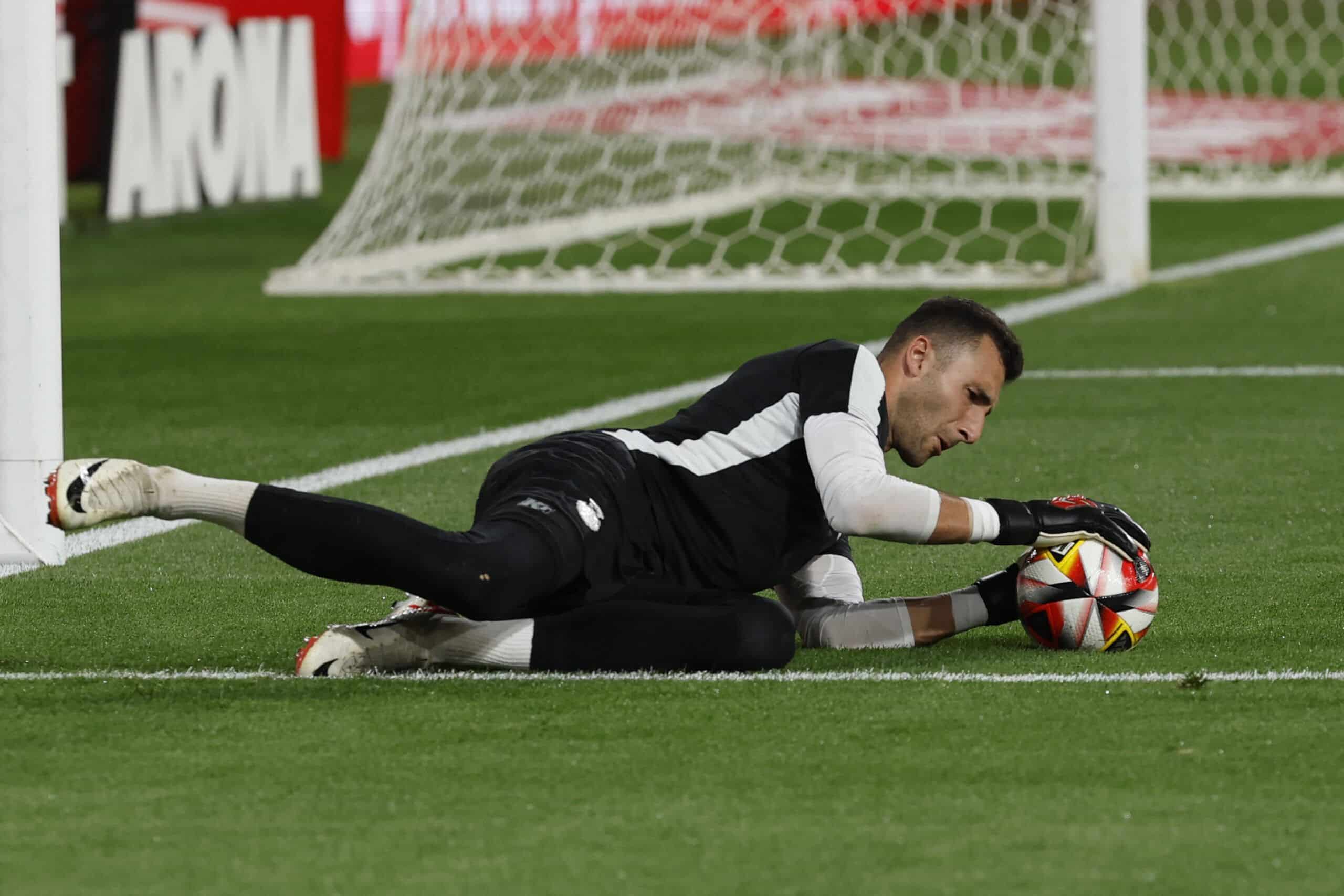 Real Mallorca's Slovakian goalkeeper #13 Dominik Greif warms up prior to the Spanish Copa del Rey (King's Cup) final football match between Athletic Club Bilbao and RCD Mallorca at La Cartuja stadium in Seville on April 6, 2024. (Photo by Jaime REINA / AFP) (Photo by JAIME REINA/AFP via Getty Images)
