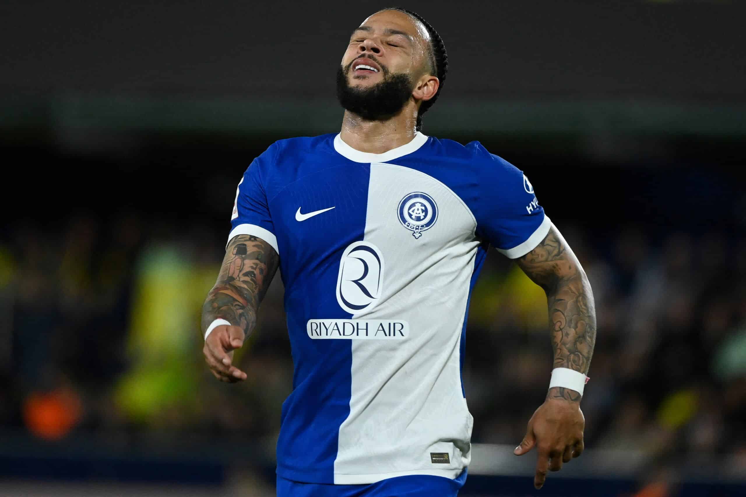 Atletico Madrid's Dutch forward #09 Memphis Depay reacts during the Spanish League football match between Villarreal CF and Club Atletico de Madrid at La Ceramica stadium in Vila-real, on April 1, 2024. (Photo by JOSE JORDAN / AFP) (Photo by JOSE JORDAN/AFP via Getty Images)