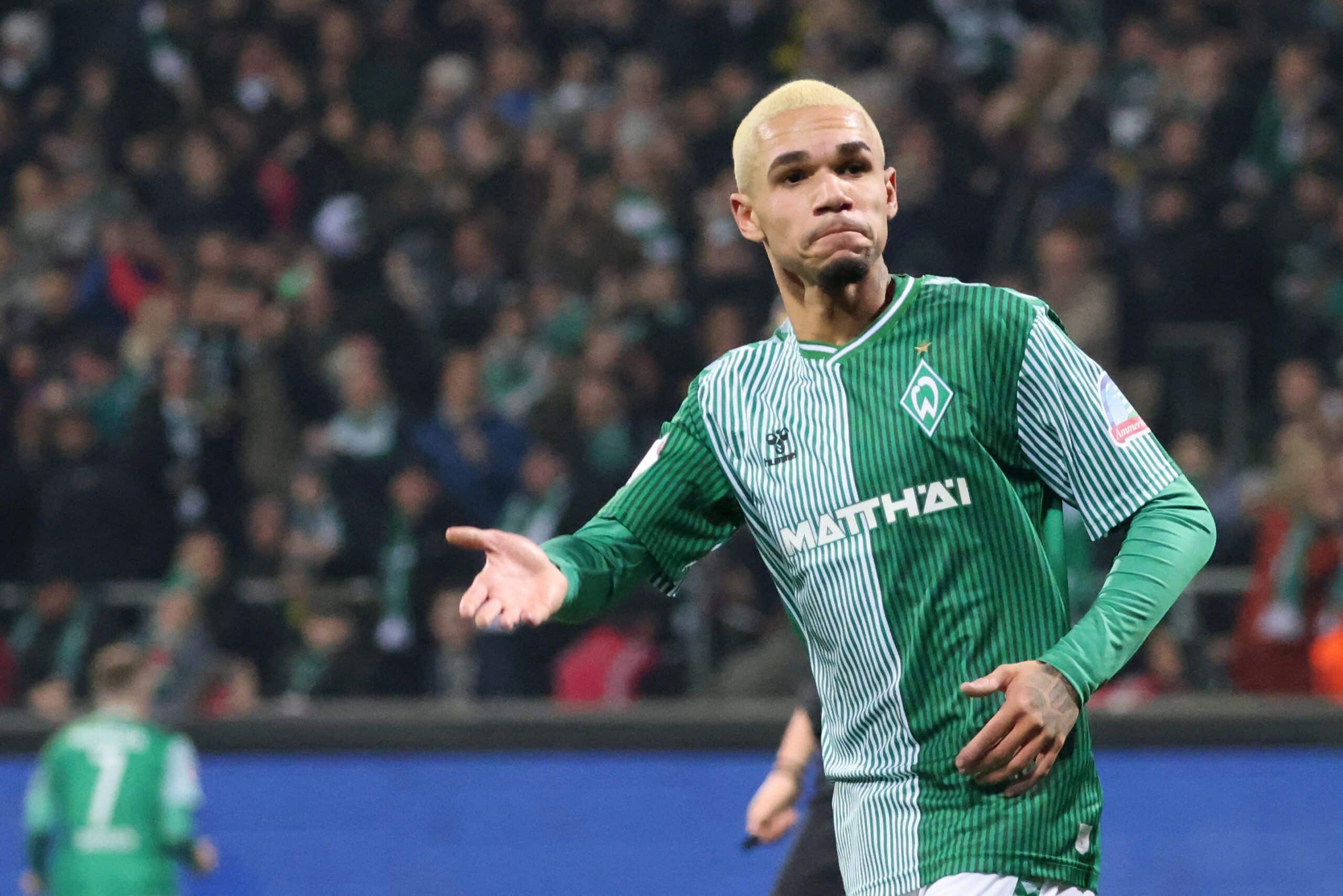 Bremen's German forward #17 Justin Njinmah celebrates scoring the 1-2 goal during the German first division Bundesliga football match Werder Bremen v Borussia Dortmund in Bremen, Germany on March 9, 2024. (Photo by Focke Strangmann / AFP) / DFL REGULATIONS PROHIBIT ANY USE OF PHOTOGRAPHS AS IMAGE SEQUENCES AND/OR QUASI-VIDEO (Photo by FOCKE STRANGMANN/AFP via Getty Images)