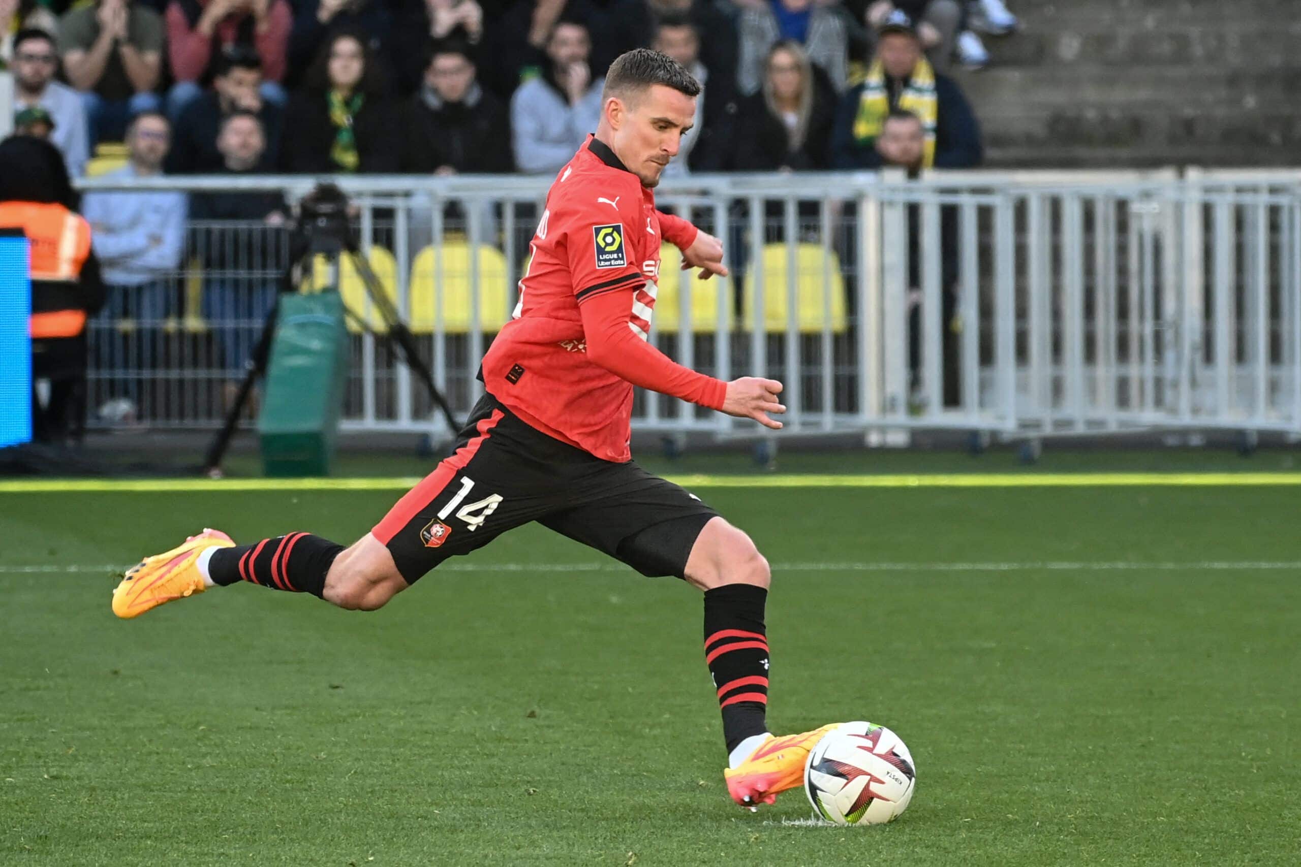 Rennes' French midfielder #14 Benjamin Bourigeaud shoots to score  a penalty during the French L1 football match between FC Nantes and Stade Rennais FC at the Stade de la BeaujoireLouis Fonteneau in Nantes, western France, on April 20, 2024. (Photo by Sebastien SALOM-GOMIS / AFP) (Photo by SEBASTIEN SALOM-GOMIS/AFP via Getty Images)