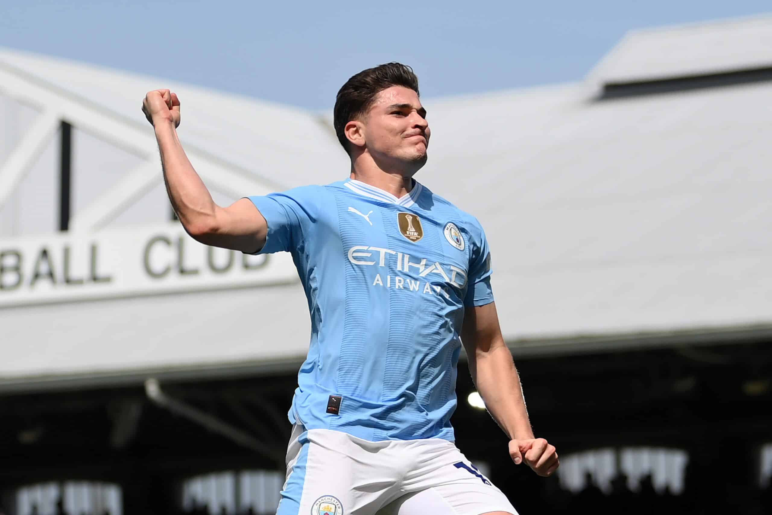 LONDON, ENGLAND - MAY 11: Julian Alvarez of Manchester City celebrates scoring his team's fourth goal during the Premier League match between Fulham FC and Manchester City at Craven Cottage on May 11, 2024 in London, England. (Photo by Justin Setterfield/Getty Images)