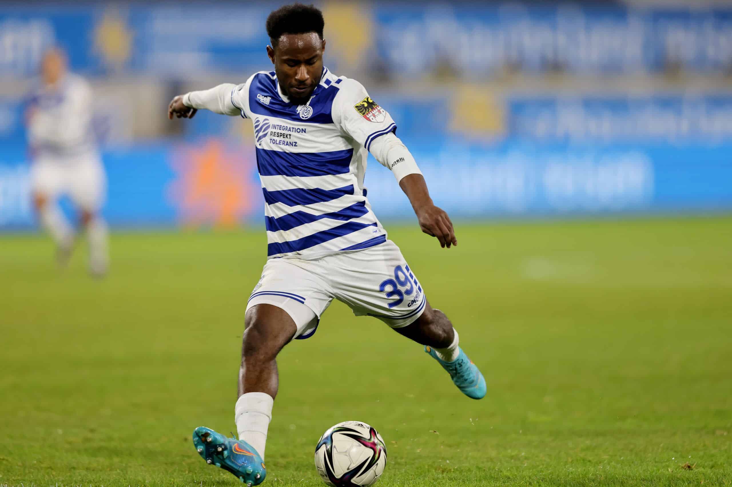 DUISBURG, GERMANY - FEBRUARY 02: John Yeboah Zamora of Duisburg runs with the ball during the 3. Liga match between MSV Duisburg and VfL Osnabrück at Schauinsland-Reisen-Arena on February 02, 2022 in Duisburg, Germany. (Photo by Christof Koepsel/Getty Images)