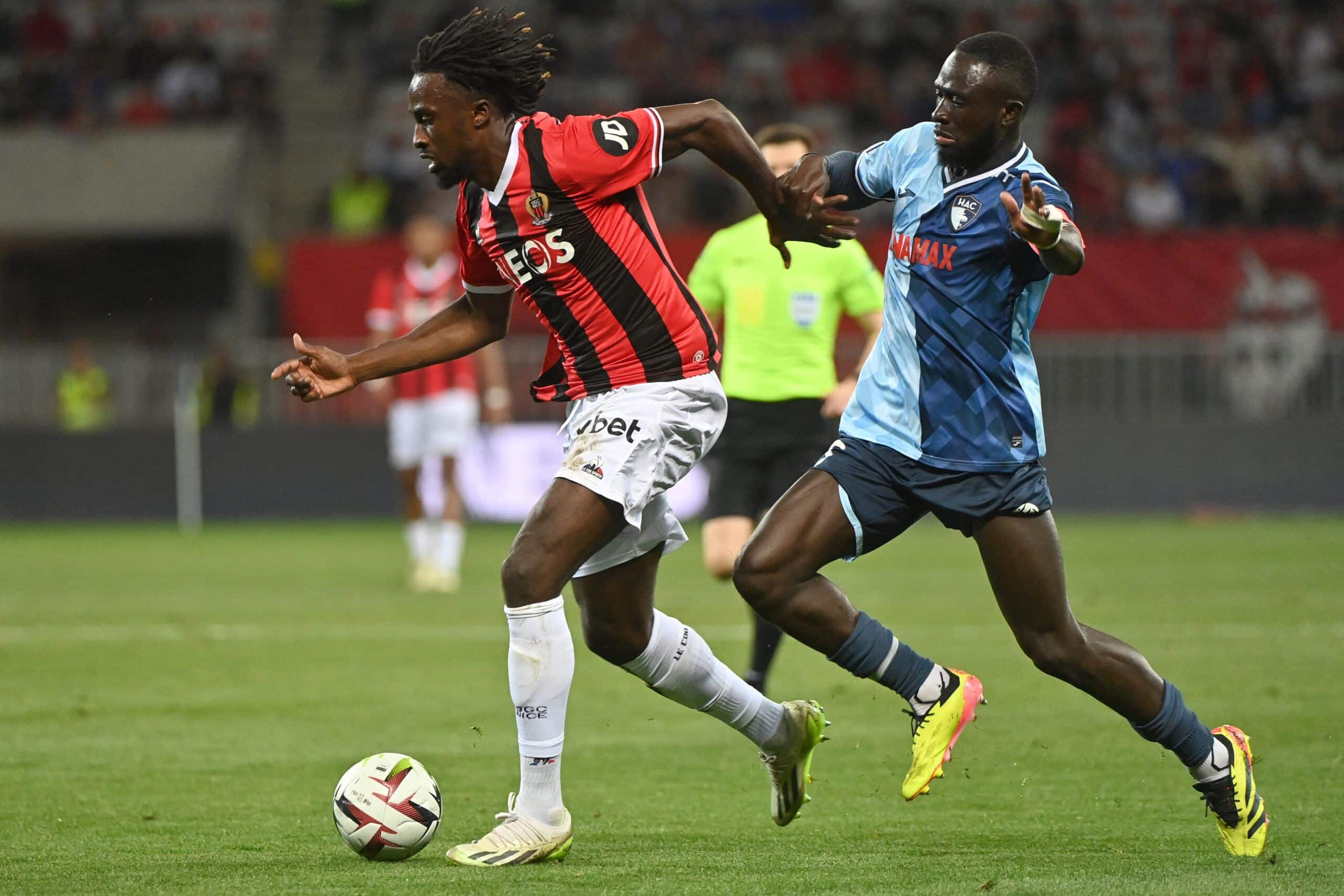 Nice's French forward #29 Evann Guessand (L) fight for the ballLe Havre's Senegalese defender #93 Arouna Sangante (R)  during the French L1 football match between OGC Nice and Le Havre AC at the Allianz Riviera Stadium in Nice, south-eastern France, on May 10, 2024. (Photo by Sylvain THOMAS / AFP) (Photo by SYLVAIN THOMAS/AFP via Getty Images)