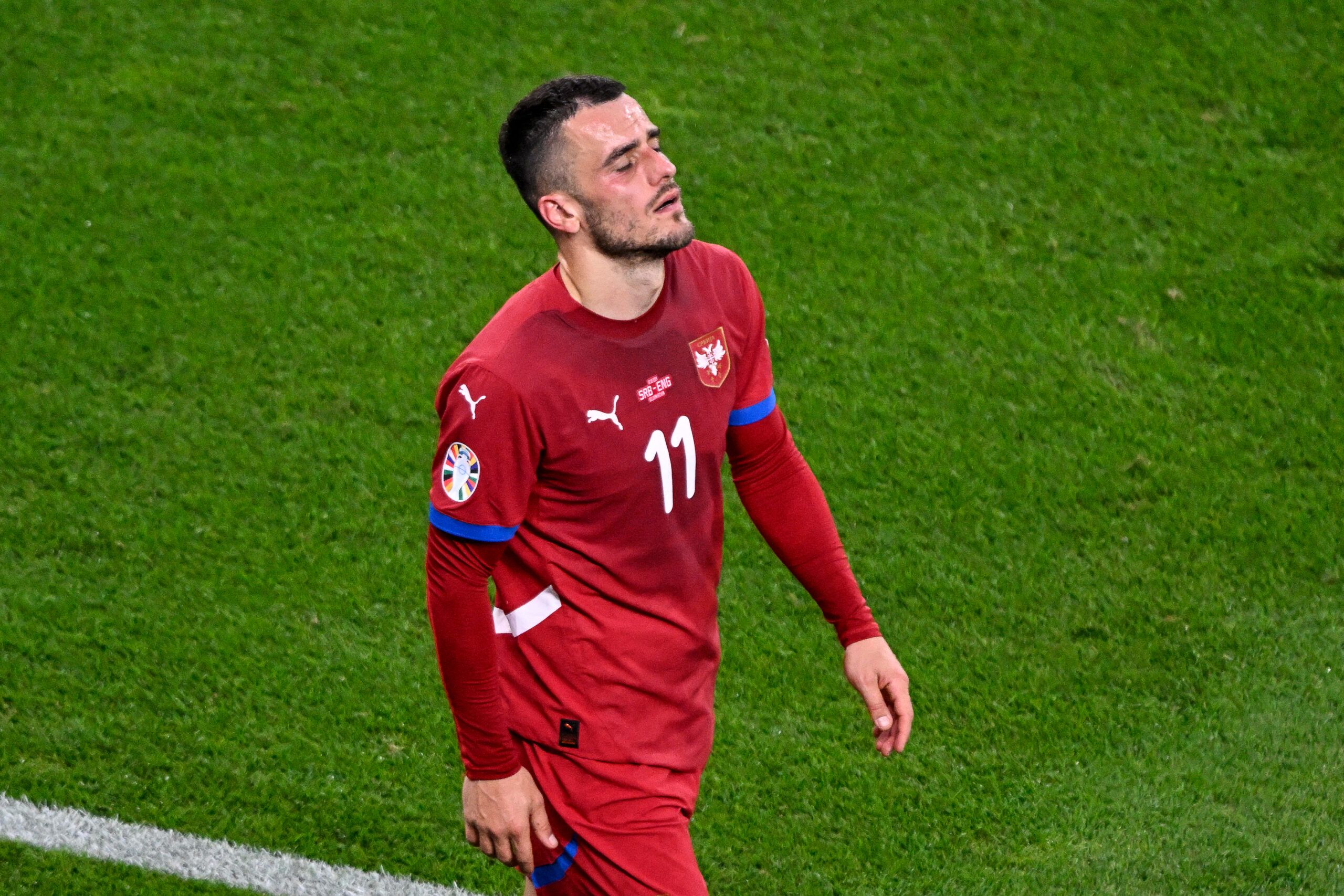 Serbia's forward #11 Filip Kostic reacts after being substituted during the UEFA Euro 2024 Group C football match between Serbia and England at the Arena AufSchalke in Gelsenkirchen on June 16, 2024. (Photo by INA FASSBENDER / AFP) (Photo by INA FASSBENDER/AFP via Getty Images)