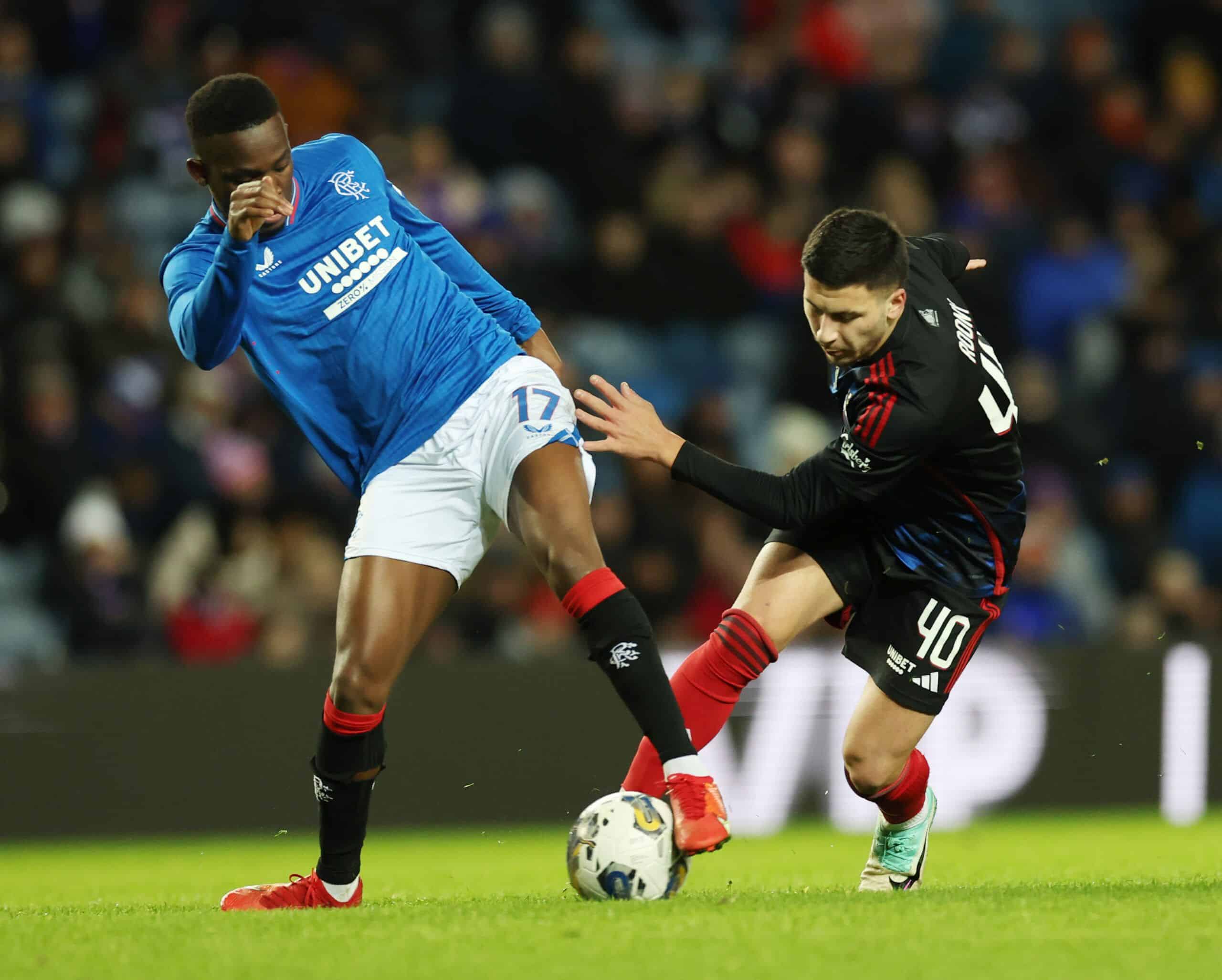 GLASGOW, SCOTLAND - JANUARY 16: Rabbi Matondo of Rangers vies with Roony Bardghji of Copenhage during the friendly match match between Rangers and FC Copenhagen at Ibrox Stadium on January 16, 2024 in Glasgow, Scotland. (Photo by Ian MacNicol/Getty Images)