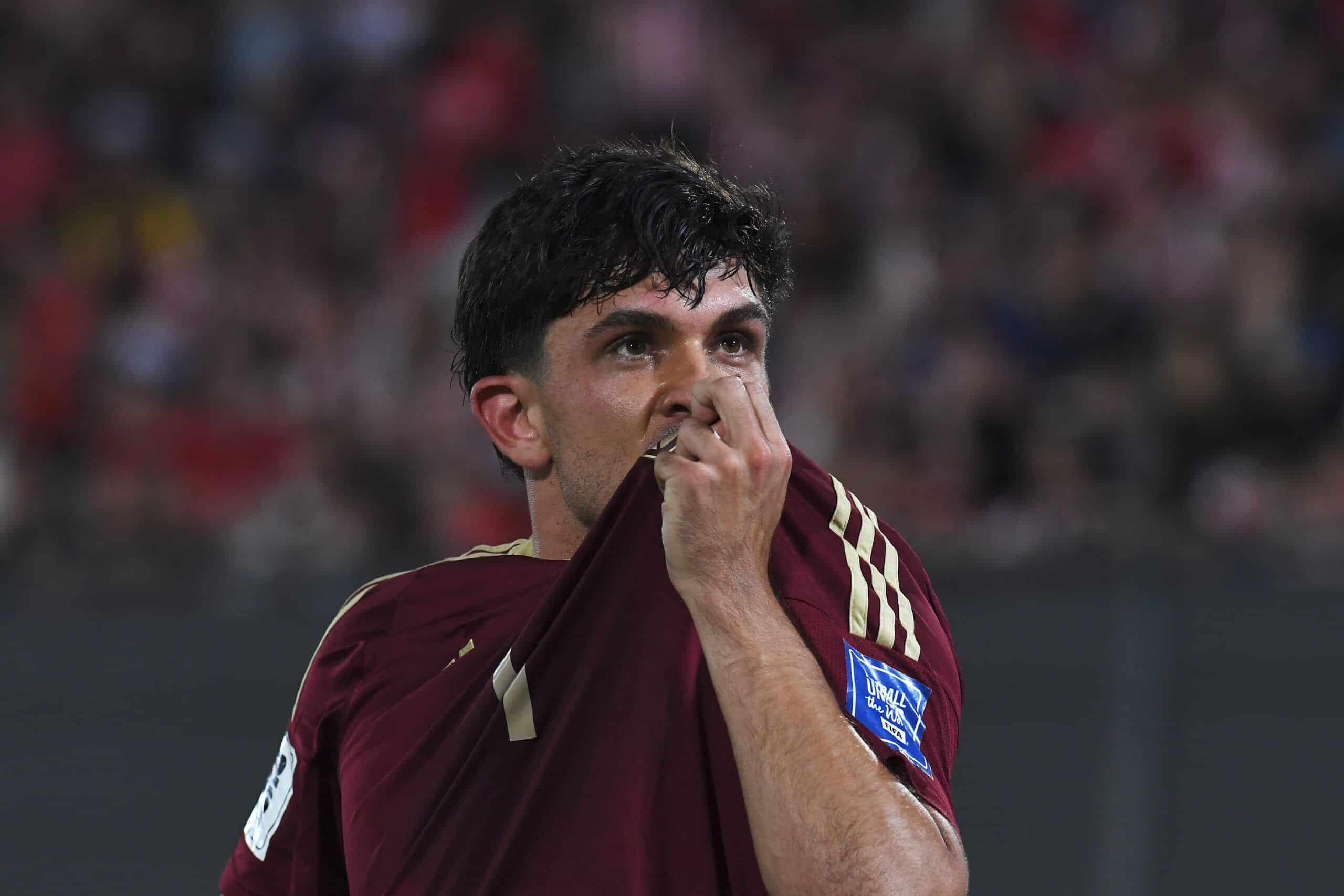 ASUNCION, PARAGUAY - OCTOBER 15: Jon Aramburu of Venezuela celebrates after scoring the team's first goal during the FIFA World Cup 2026 South American Qualifier match between Paraguay and Venezuela at Estadio Defensores del Chaco on October 15, 2024 in Asuncion, Paraguay. (Photo by Christian Alvarenga/Getty Images)