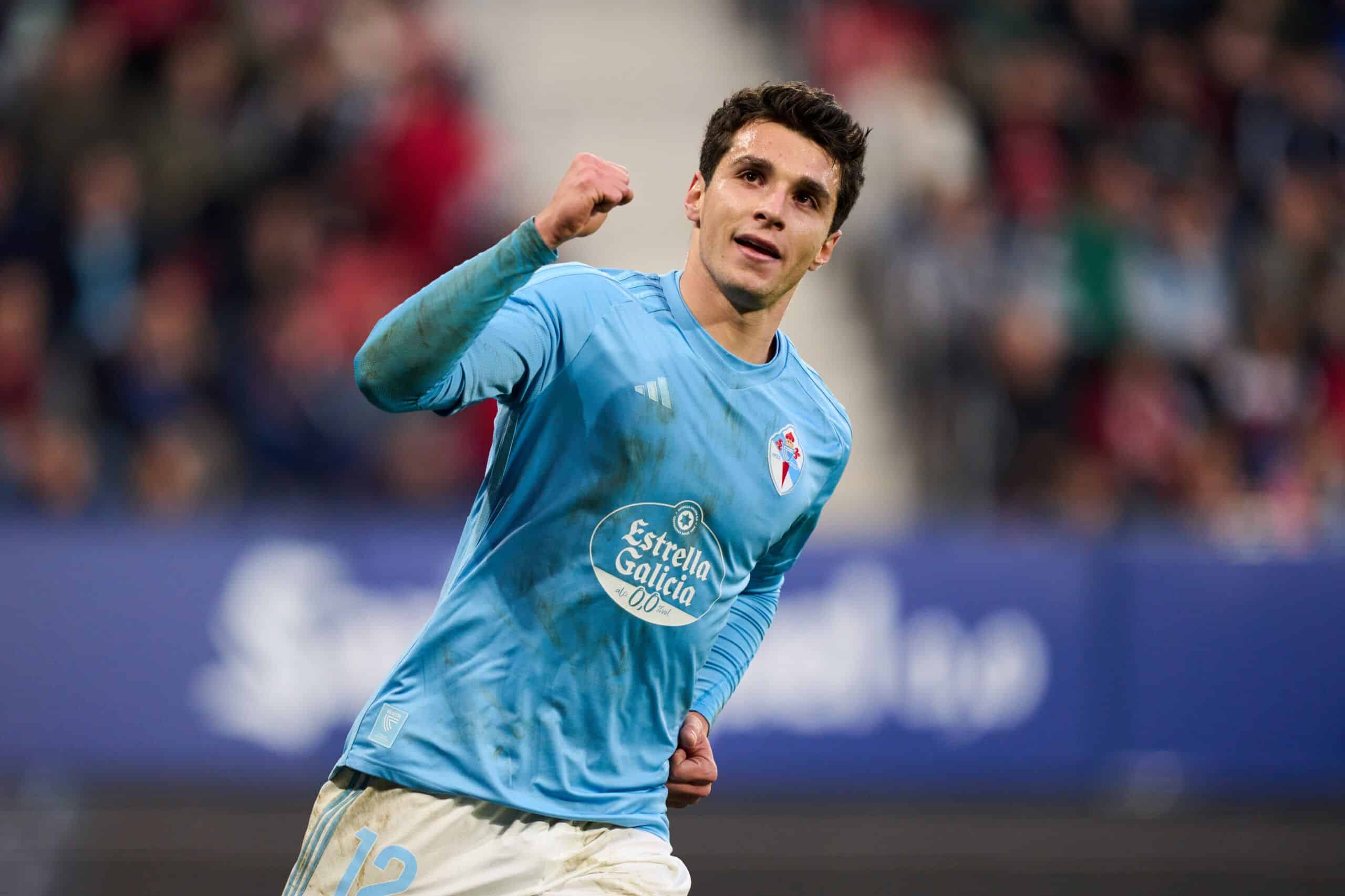 PAMPLONA, SPAIN - FEBRUARY 04: Anastasios Douvikas of RC Celta Vigo celebrates after scoring his team's third goal during the LaLiga EA Sports match between CA Osasuna and Celta Vigo at Estadio El Sadar on February 04, 2024 in Pamplona, Spain. (Photo by Juan Manuel Serrano Arce/Getty Images)
