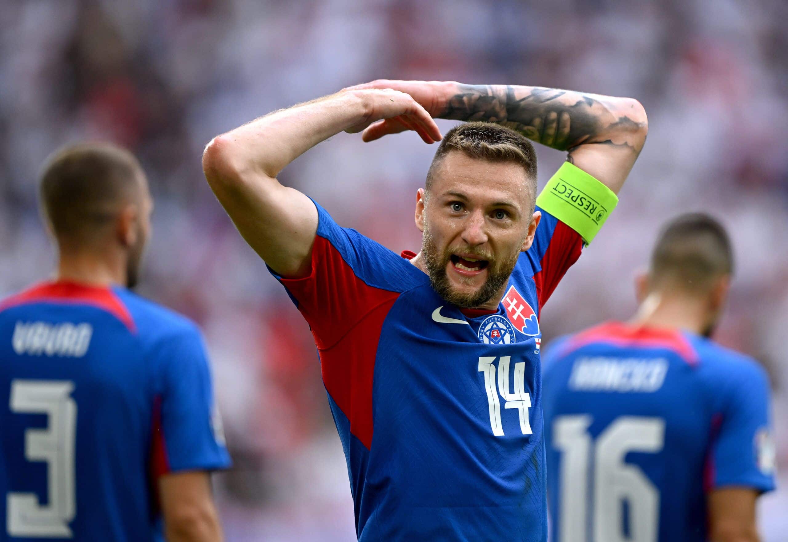 GELSENKIRCHEN, GERMANY - JUNE 30: Milan Skriniar of Slovakia reacts after teammate Ivan Schranz (not pictured) scores their team's first goal during the UEFA EURO 2024 round of 16 match between England and Slovakia at Arena AufSchalke on June 30, 2024 in Gelsenkirchen, Germany. (Photo by Clive Mason/Getty Images)