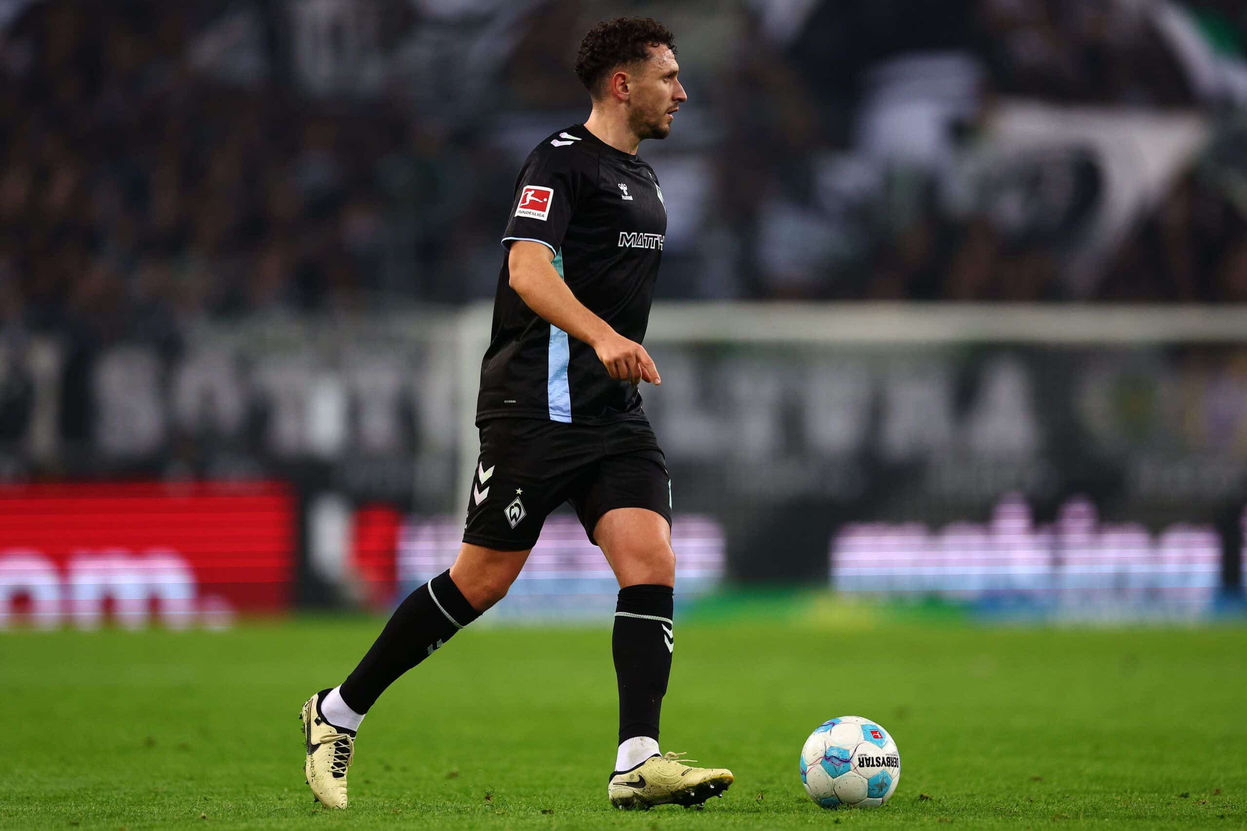 MOENCHENGLADBACH, GERMANY - NOVEMBER 03: Milos Veljkovic of Werder Bremen in action during the Bundesliga match between Borussia Mönchengladbach and SV Werder Bremen at Borussia-Park on November 03, 2024 in Moenchengladbach, Germany. (Photo by Dean Mouhtaropoulos/Getty Images)