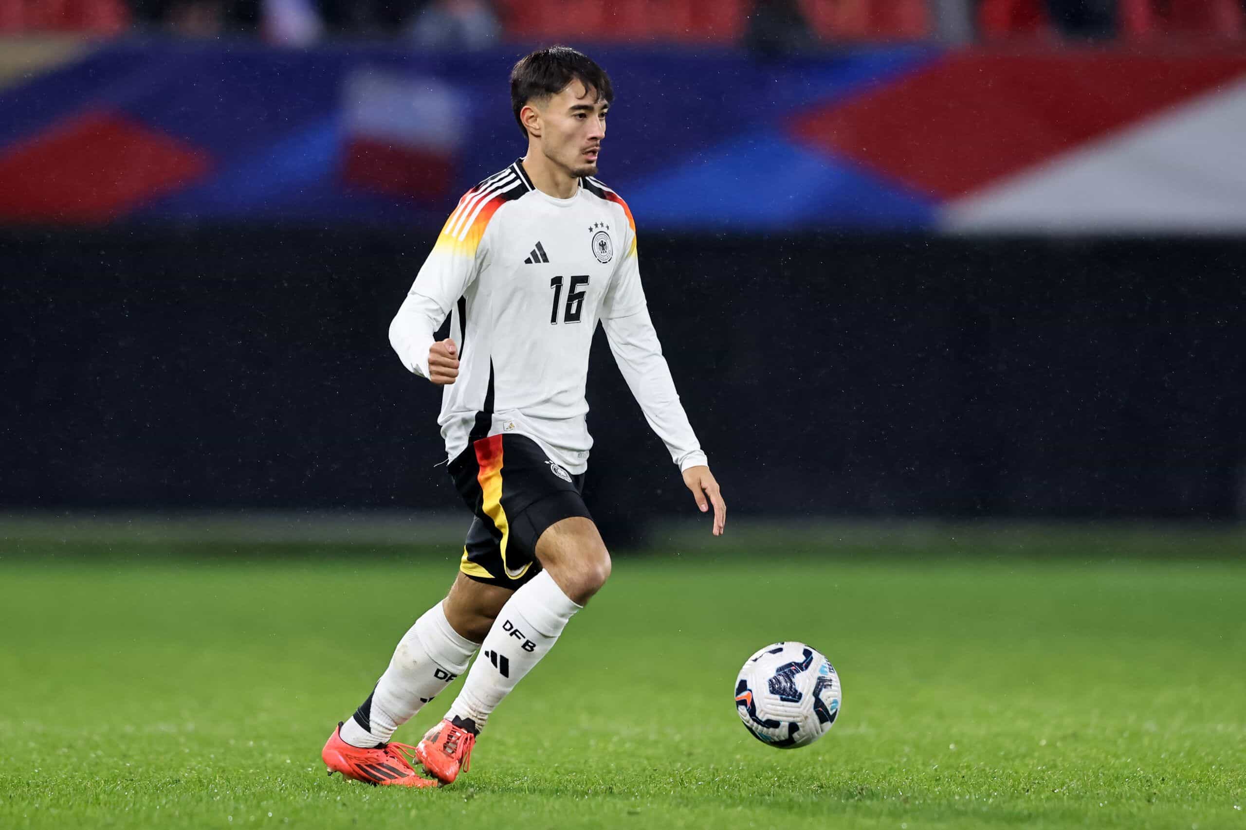 VALENCIENNES, FRANCE - NOVEMBER 19: Jens Castrop of Germany runs with the ball during the friendly match between France U21 and Germany U21 at Stade du Hainaut on November 19, 2024 in Valenciennes, France (Photo by Christof Koepsel/Getty Images)