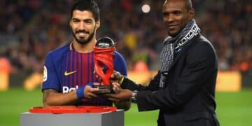 Luis Suárez y Eric Abidal.