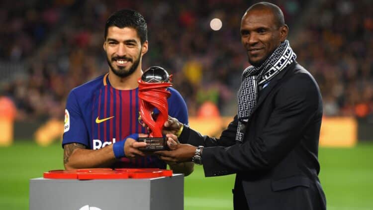 Luis Suárez y Eric Abidal.