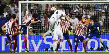 LISBON, PORTUGAL - MAY 24:  Sergio Ramos of Real Madrid (4) scores their first goal with a header during the UEFA Champions League Final between Real Madrid and Atletico de Madrid at Estadio da Luz on May 24, 2014 in Lisbon, Portugal.  (Photo by Laurence Griffiths/Getty Images)